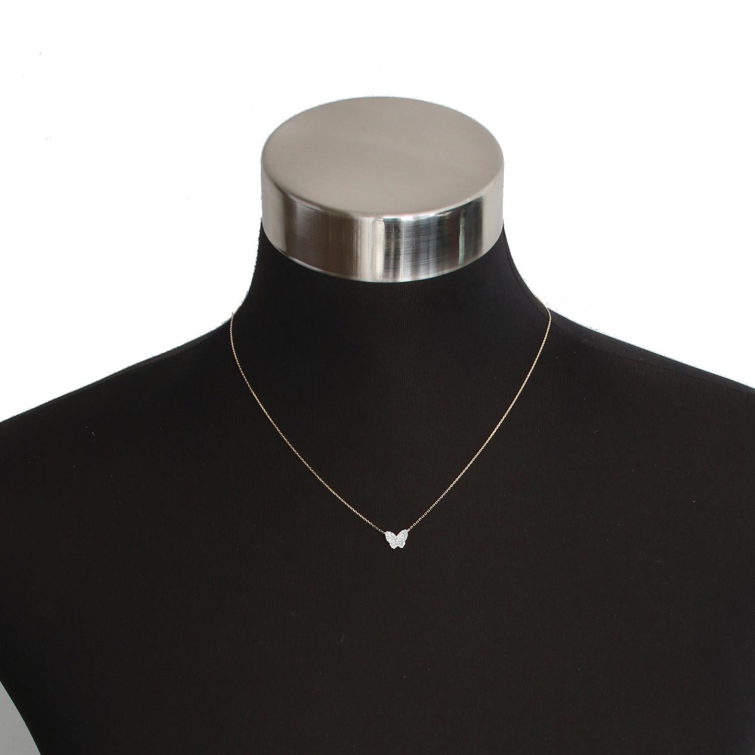 Collier papillon en or jaune 14K - Magnifique papillon serti de diamants en or jaune 14K. Poids approximatif de 0,09 cts. Longueur totale de 16 pouces avec un rehausseur de 2 pouces. Taille du pendentif 9 mm . 