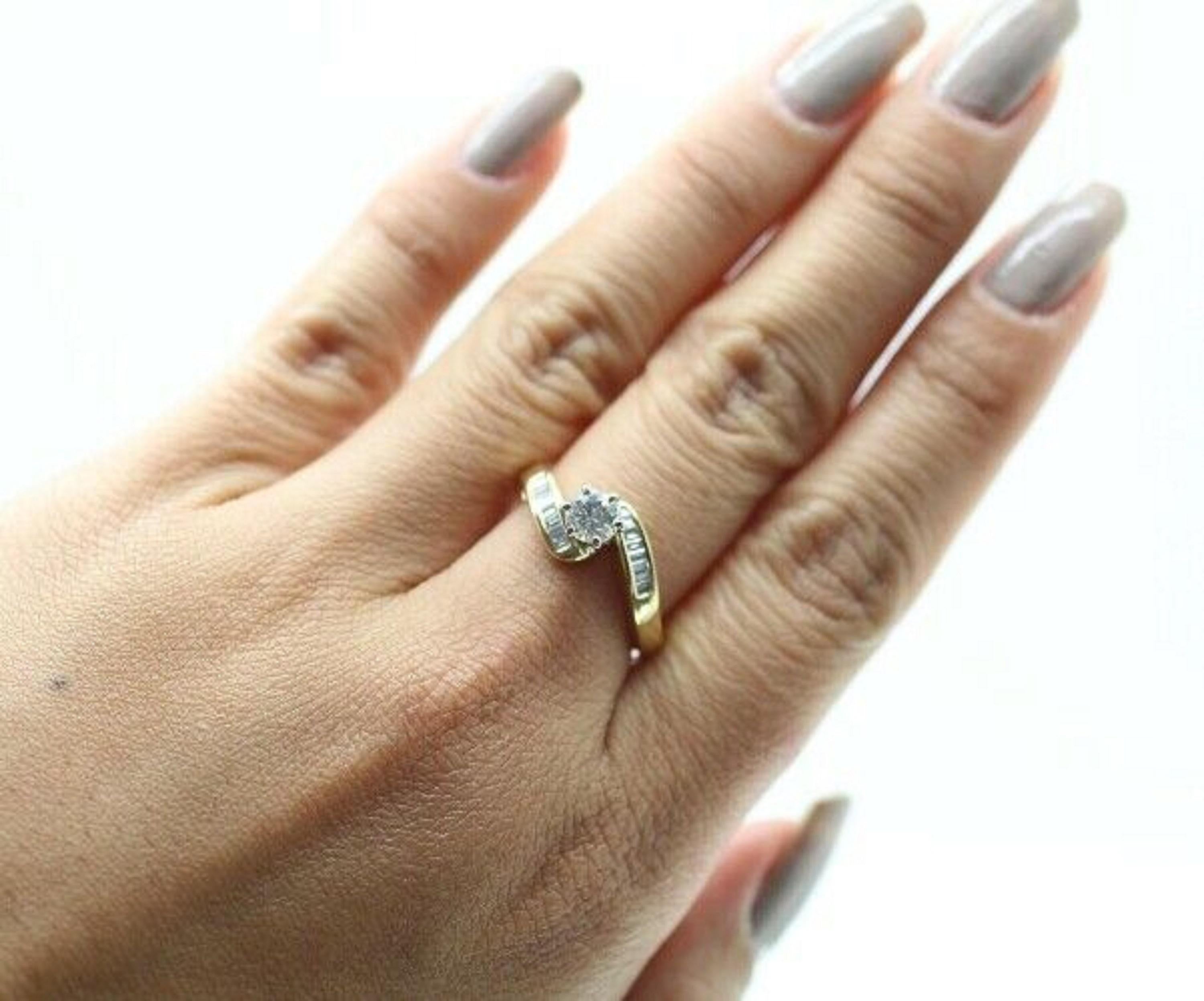kelly baguette ring