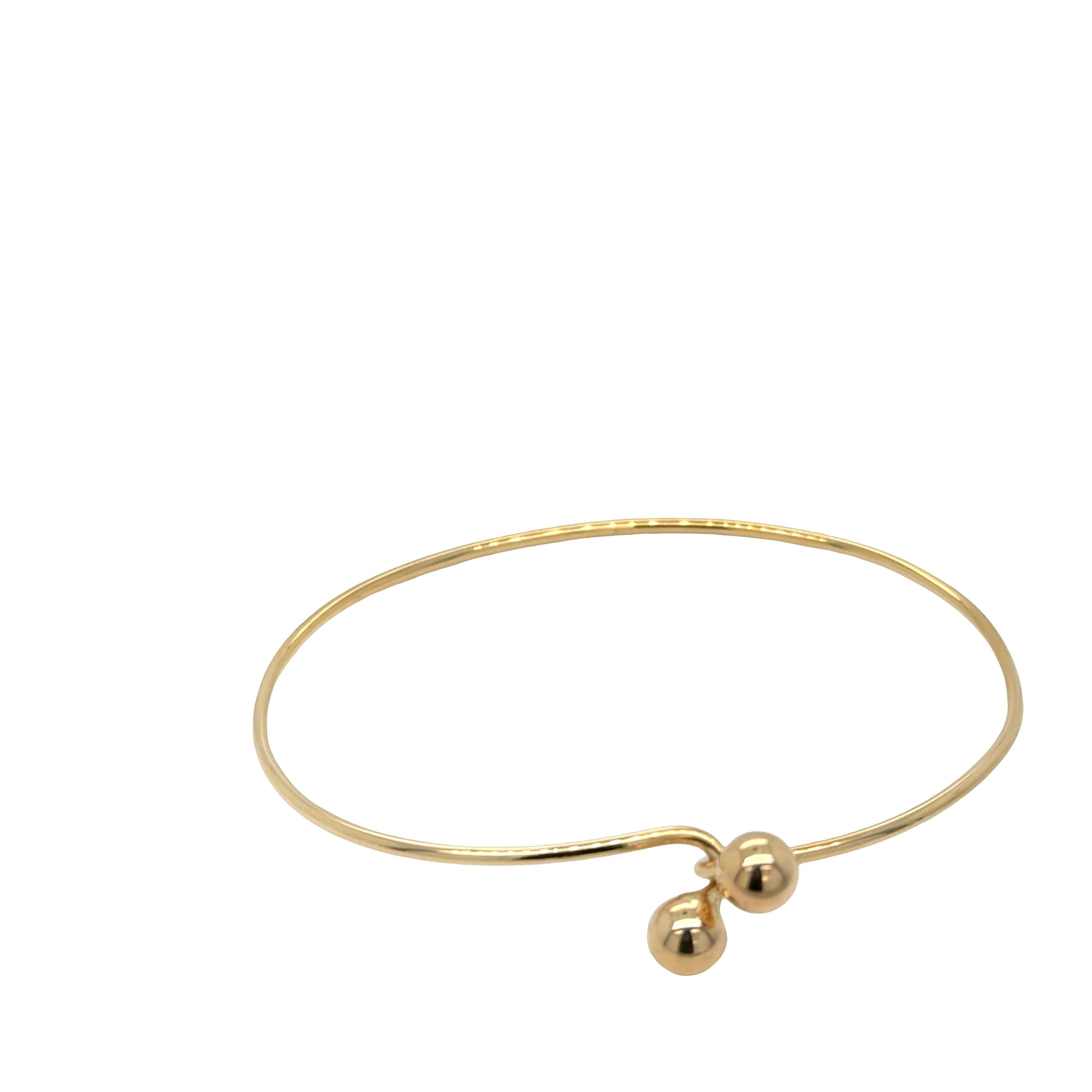 Bracciale con perline bypass in oro giallo 14k In condizioni ottime in vendita a beverly hills, CA