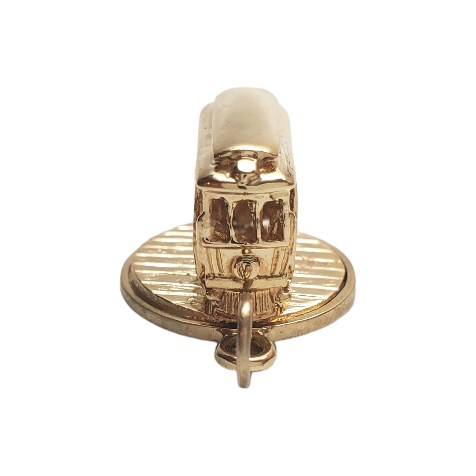 14K Yellow Gold Cable Car Charm

Capture the charm of San Francisco in a golden whirl! This 14K yellow gold articulating cable car charm is your ticket to fun!

Hallmark: 14K

Weight: 5.1 g/ 3.3 dwt.

Size: 11.8 mm X 14.9 mm X 15.8 mm 

Very good