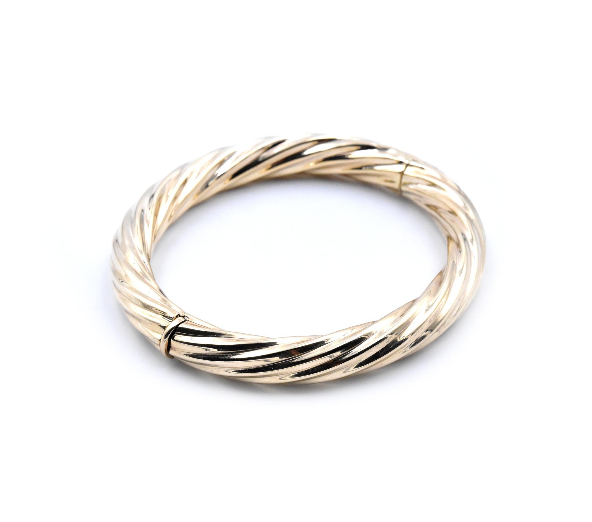 Material: 14k yellow gold
Dimensions: bracelet measures 7-inches in length
Weight: 14.69 grams
