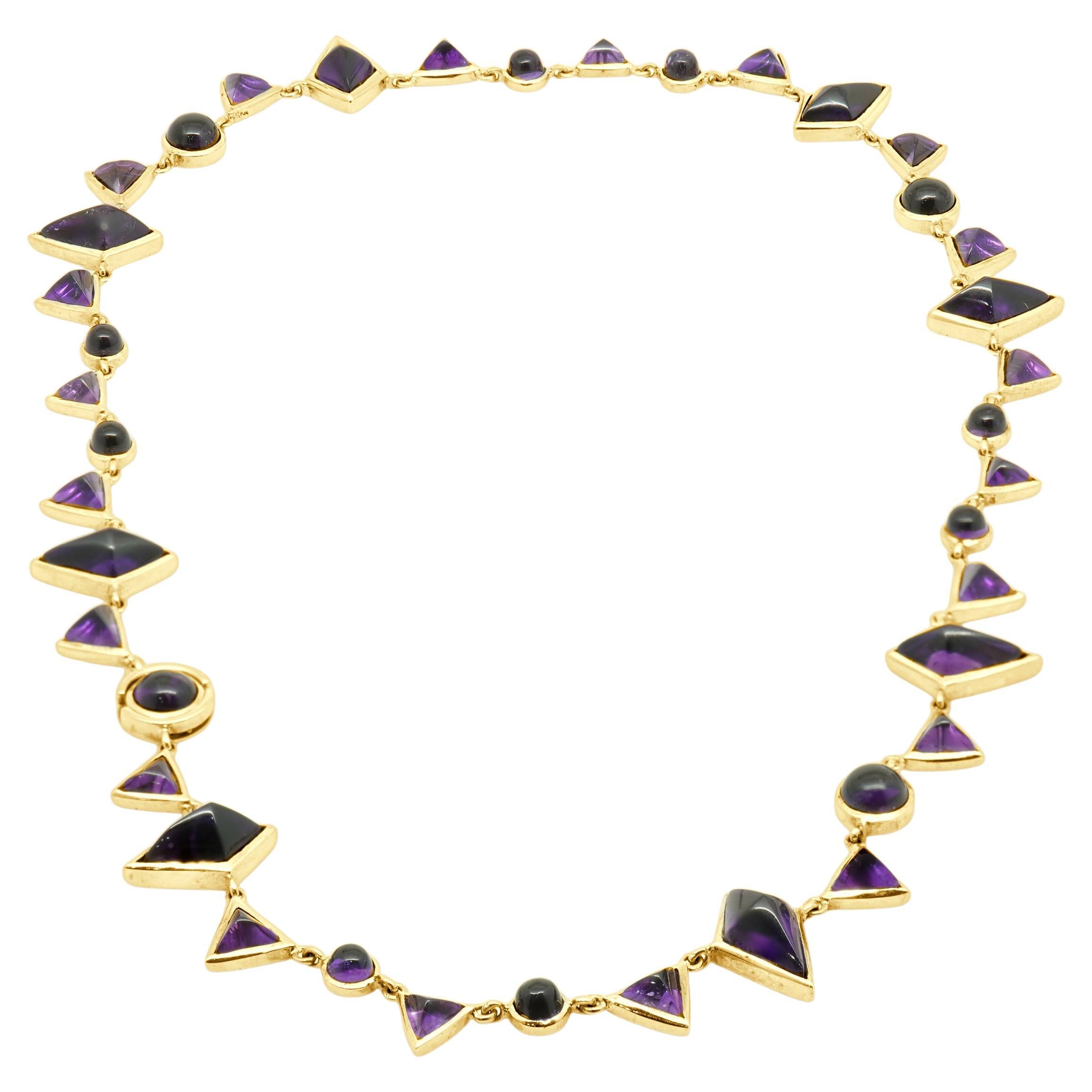 Collana con ametista cabochon in oro giallo 14K