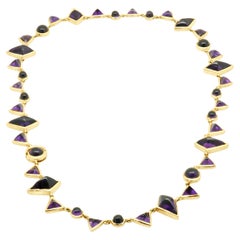 Collana con ametista cabochon in oro giallo 14K