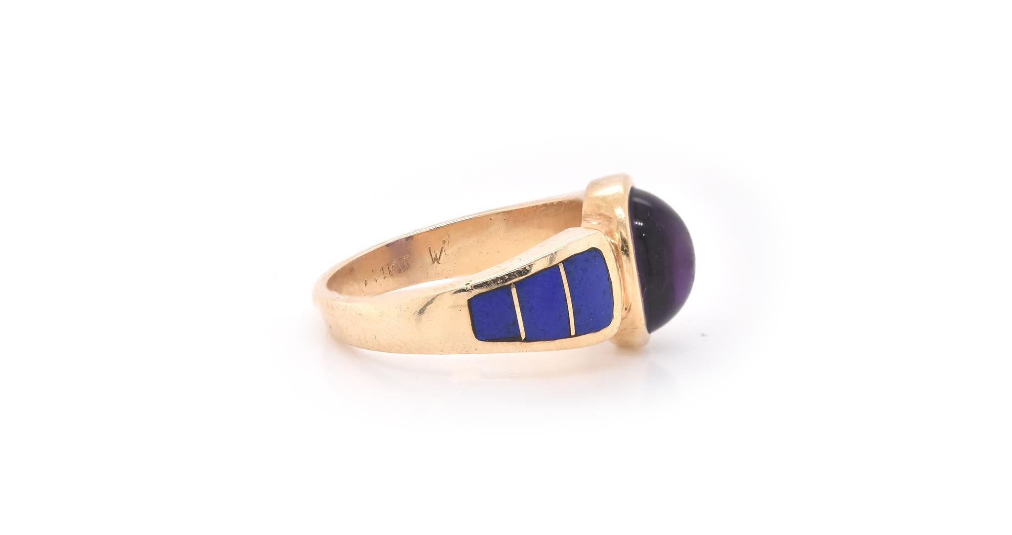 Material: 14k Yellow Gold
Gemstones: Amethyst Cabochon and Lapis
Ring Size: 7 ¾  (allow up to two additional business days for sizing requests)
Weight: 6.71 grams
