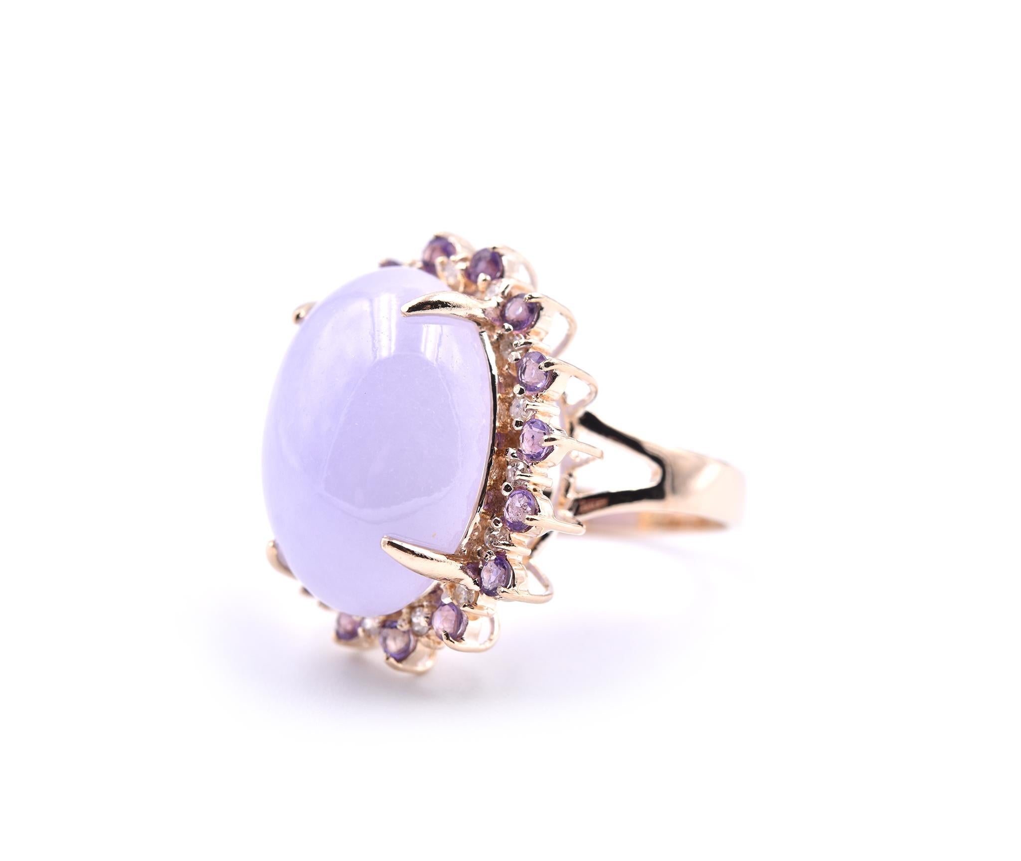 Designer: custom design
Material: 14k yellow gold
Center Stone: 1 cabochon lavender jade
Diamonds: 16 round brilliant cuts
Amethyst: 16 round cut amethyst
Ring Size: 7 ½ (please allow two additional shipping days for sizing requests)
Dimensions: