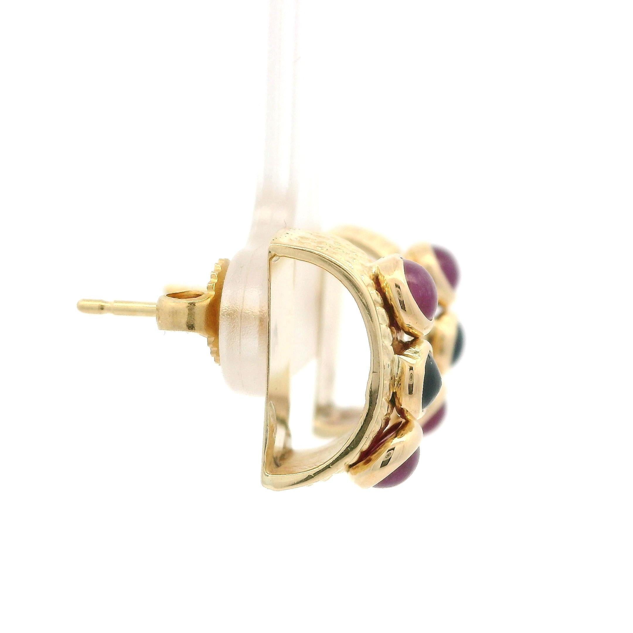 --Stone(s):--
(2) Natural Genuine Sapphires - Round Cabochon - Deep Blue Color - 3.0mm (approx.)
(4) Natural Genuine Rubies - Round Cabochon - Nice Red Color -3.33mm (approx.)

Material: Solid 14k Yellow Gold
Weight: 5.5 Grams
Backing: Posts w/