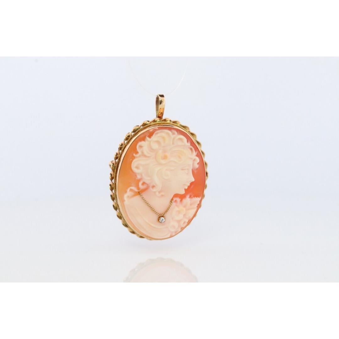 Vintage from the 1950s

Materials: cameo brooch, cameo brooch pendant, cameo pin brooch pendant

14k Gold Carved Cameo Shell Brooch and Pendant.

Xlarge in size. 1.8mm diamond in the necklace.

Marked 14k and test appropriately.

Details:
6.3grams