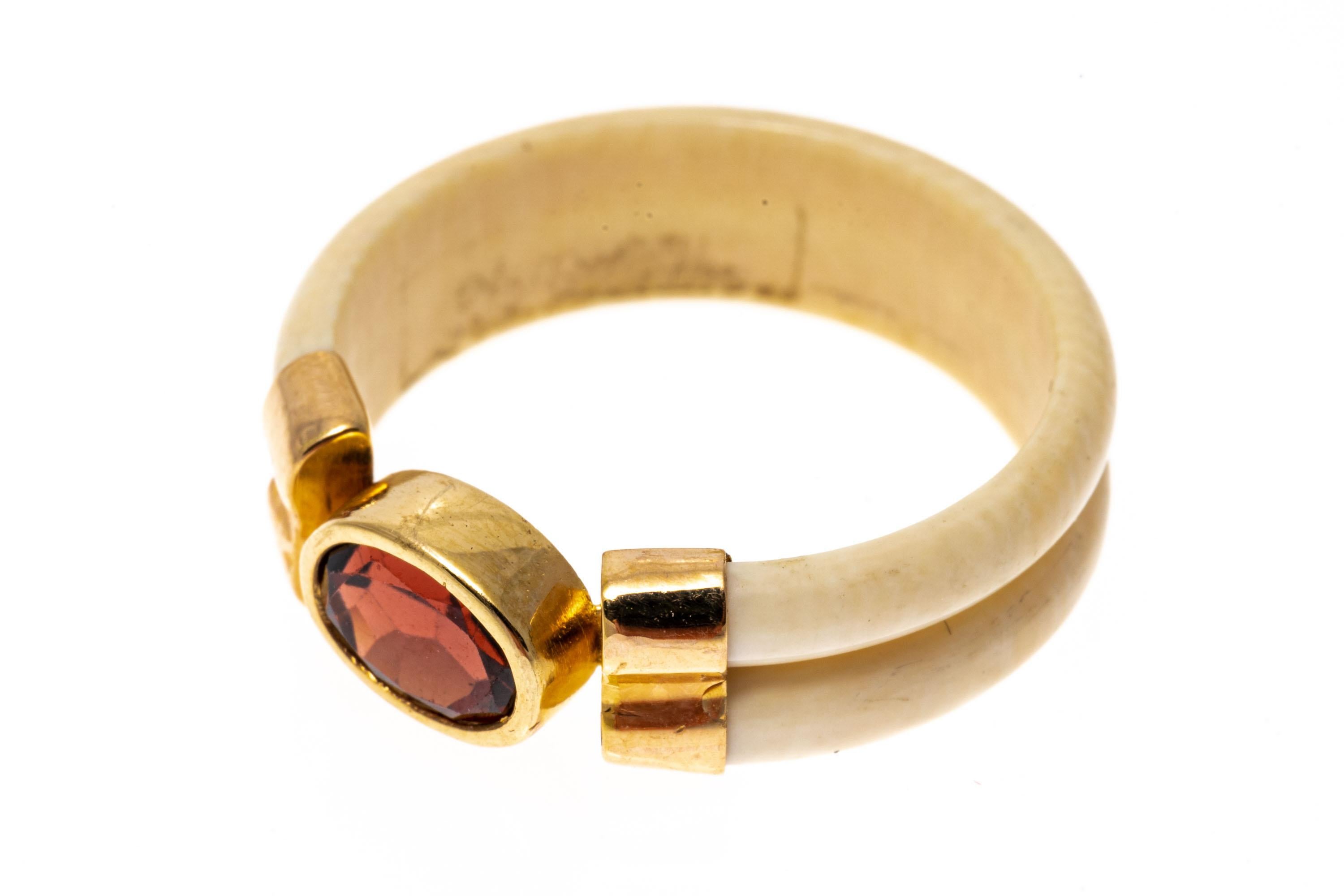 Oval Cut 14k Yellow Gold Carved Bone And Bezel Set Garnet Band Ring, Size 7.25 For Sale