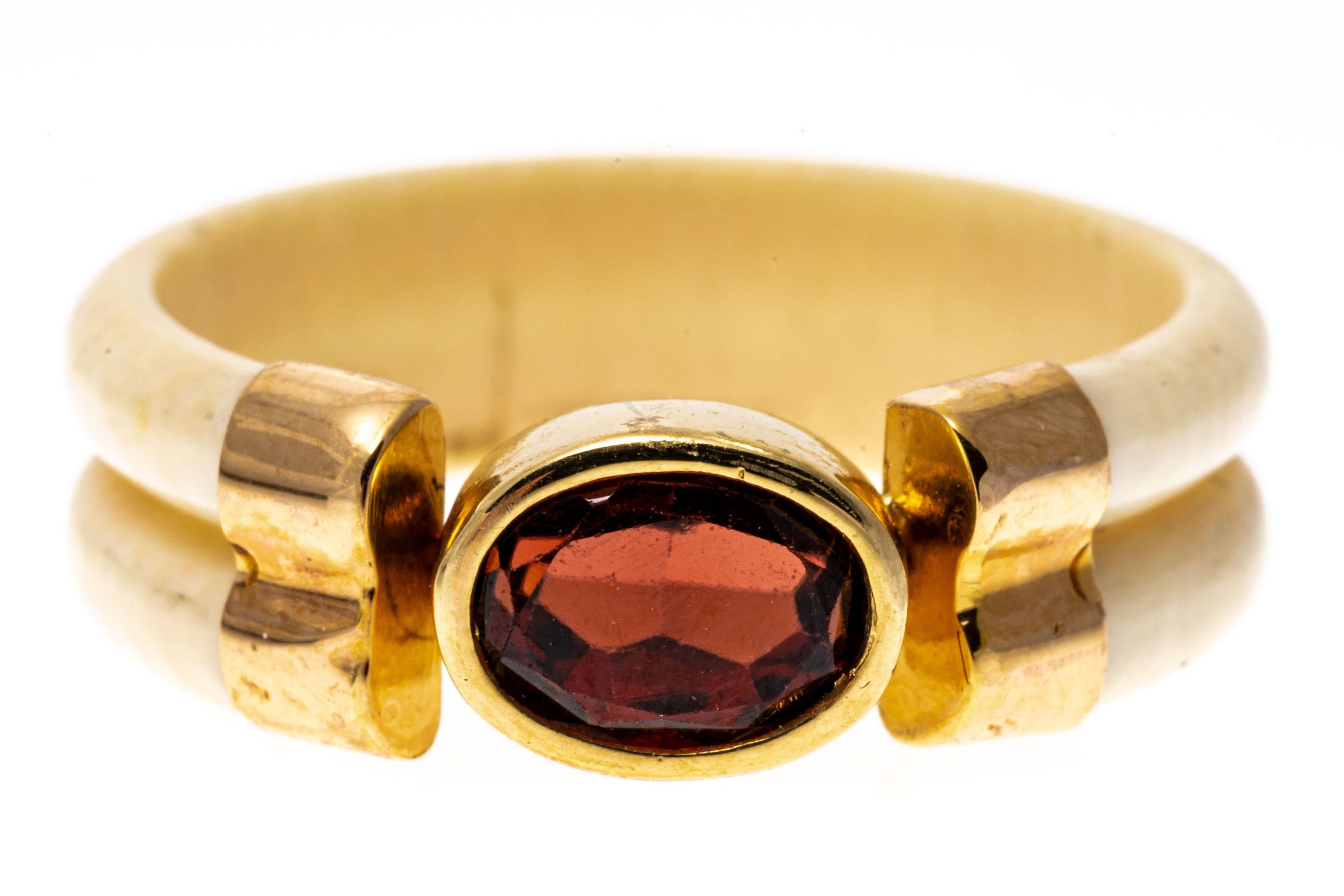 Women's 14k Yellow Gold Carved Bone And Bezel Set Garnet Band Ring, Size 7.25 For Sale