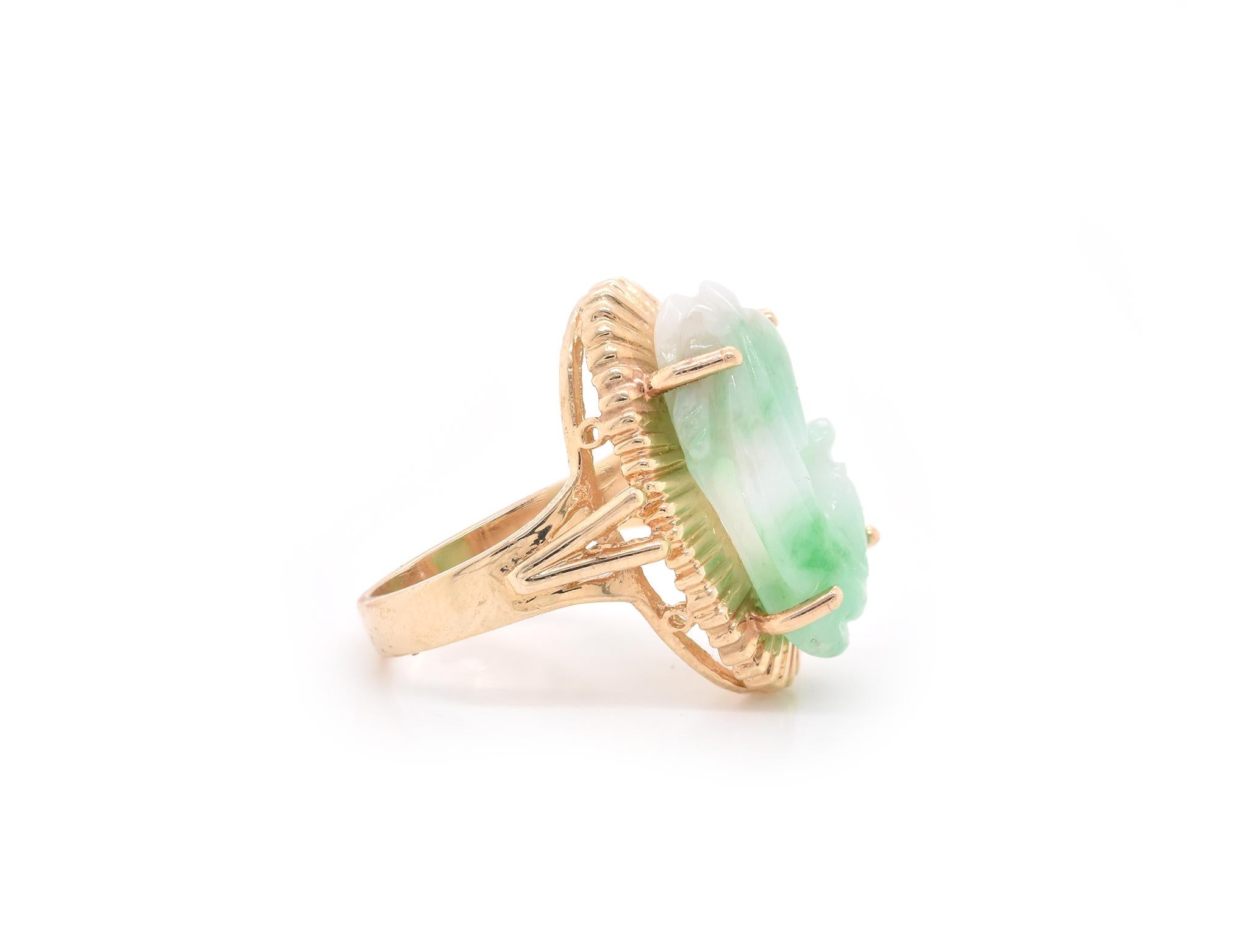 Designer: custom
Material: 14k yellow gold
Jade: 20.50mm x 12.80mm
Ring size: 6 ¼ (please allow two additional shipping days for sizing requests)
Dimensions: ring is approximately 23.05mm x 17.05mm
Weight: 6.86 grams
