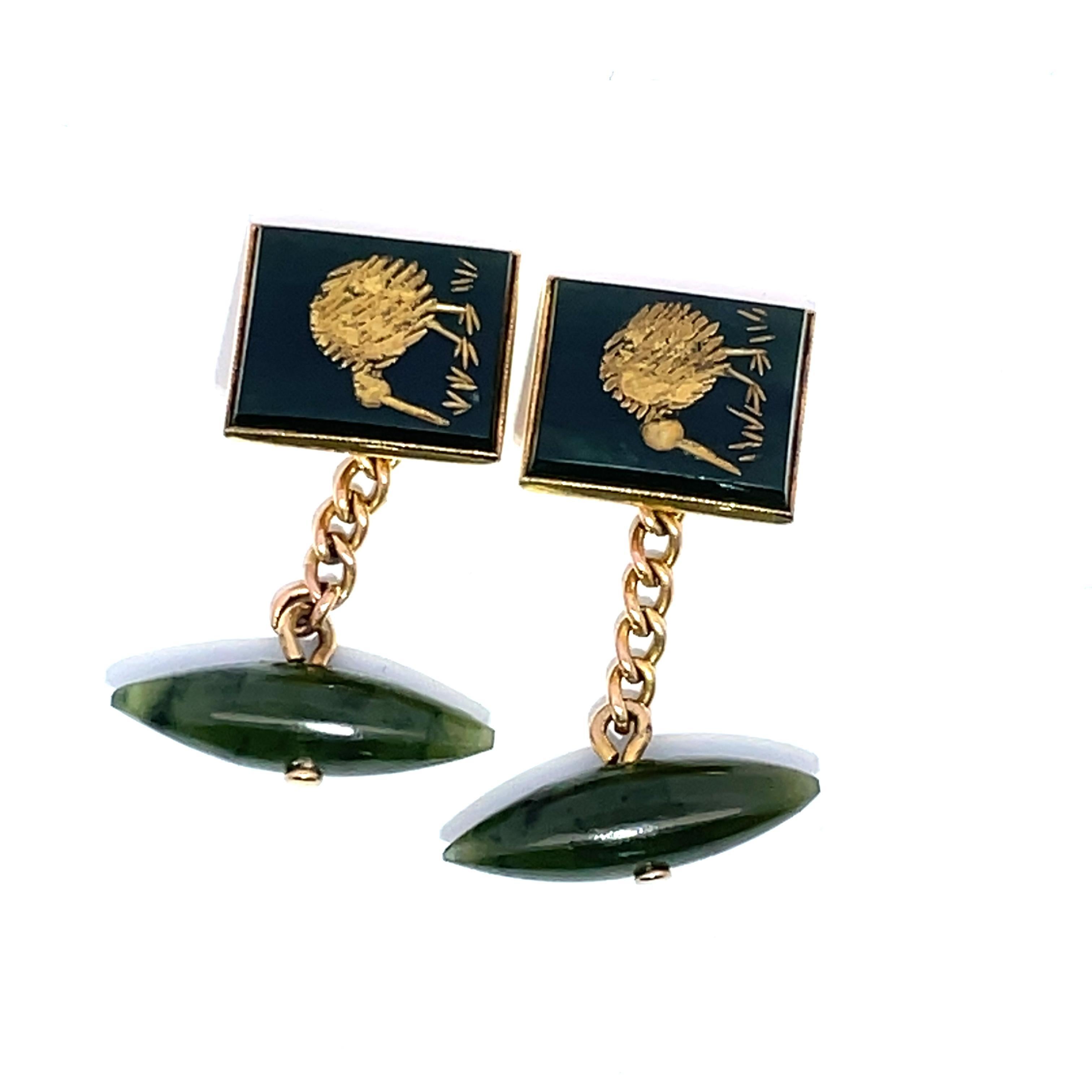 Elevate your accessory game with these exquisite cufflinks, featuring a stunning kiwi design that beautifully combines vibrant green jade with luxurious 14k yellow gold. Each cufflink is meticulously crafted, weighing 6.87 grams, ensuring a