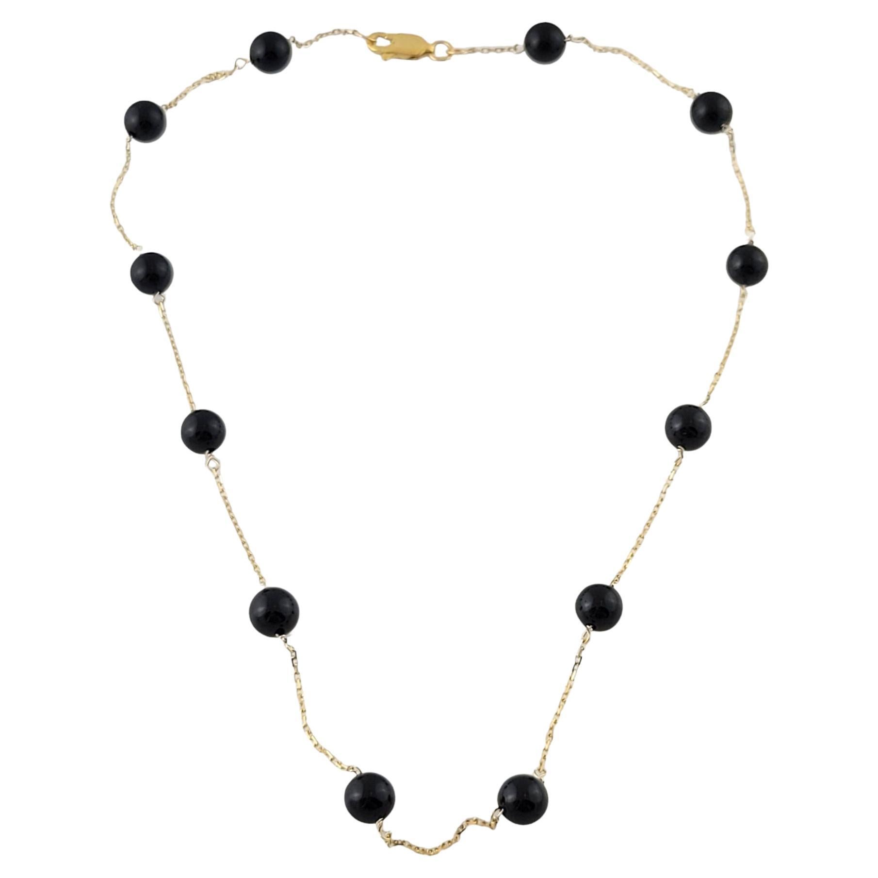 Chaîne en or jaune 14 carats et collier en onyx noir en vente