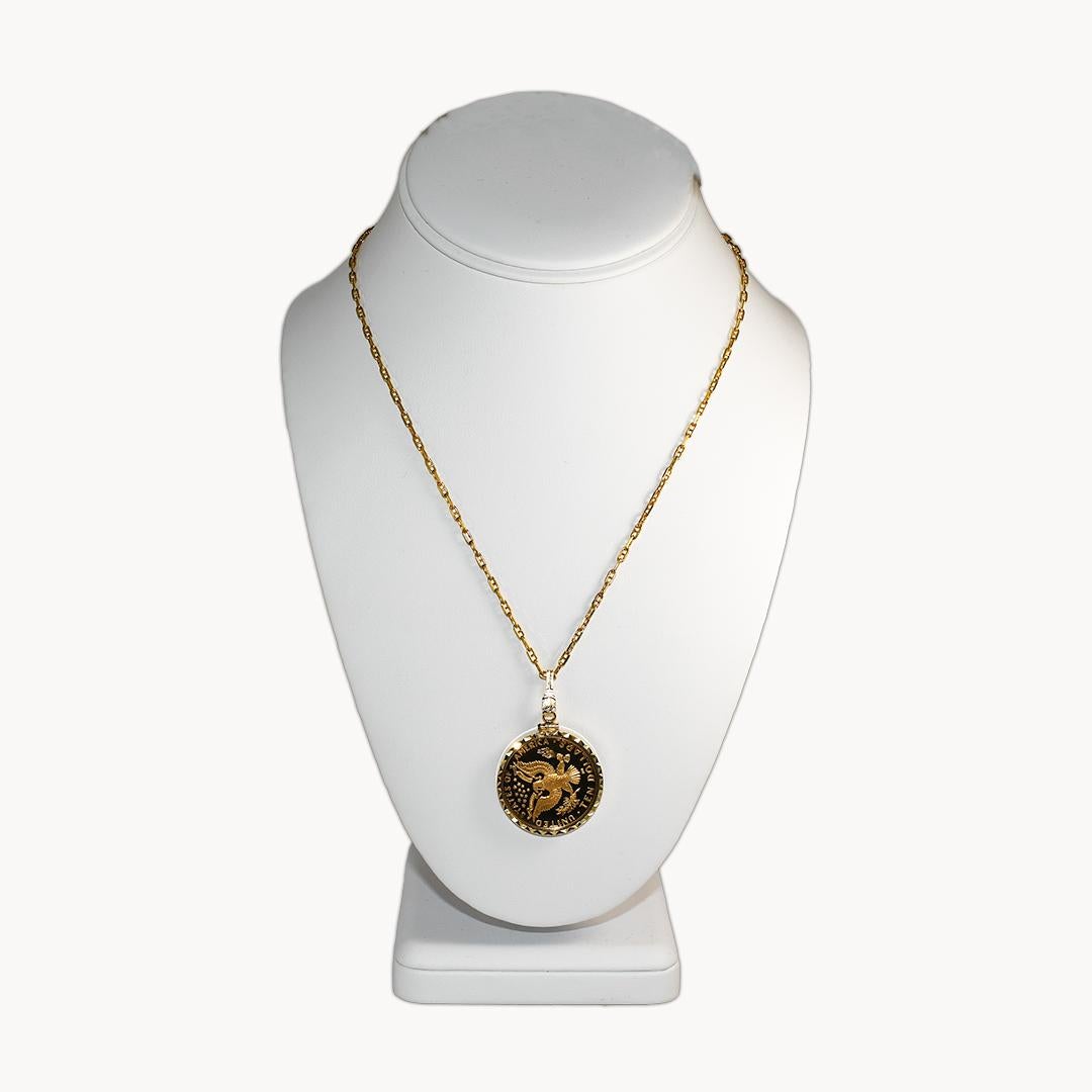 1984 $10 Commemorative Olympic Gold coin set in 14k pendant with a 14k chain attached.
The $10 gold coin is .483ozt pure. 
The bezel and chain both test 14k.
Total weight 25.6 grams.