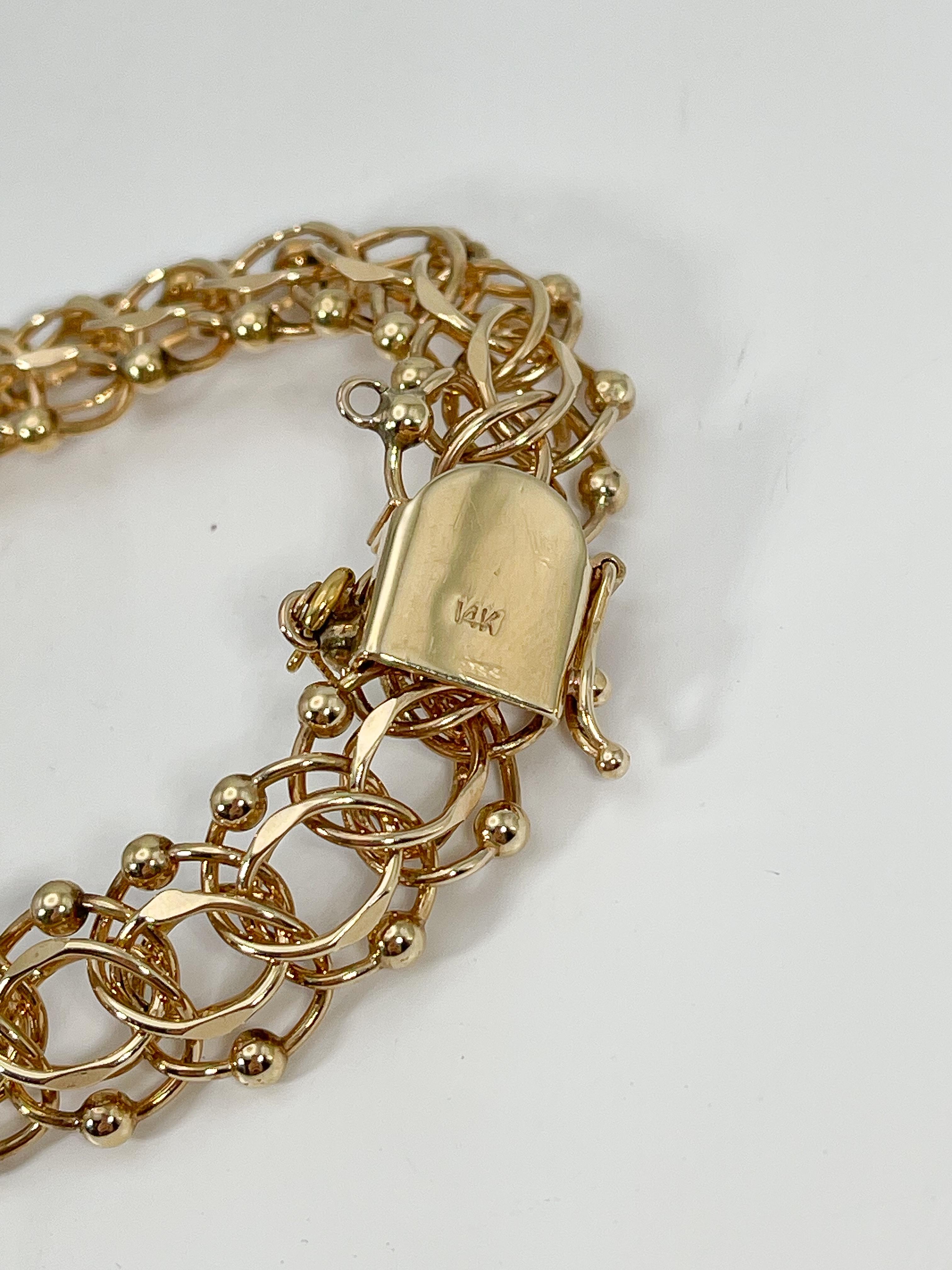 14K Yellow Gold Charm Bracelet In Good Condition For Sale In Stuart, FL