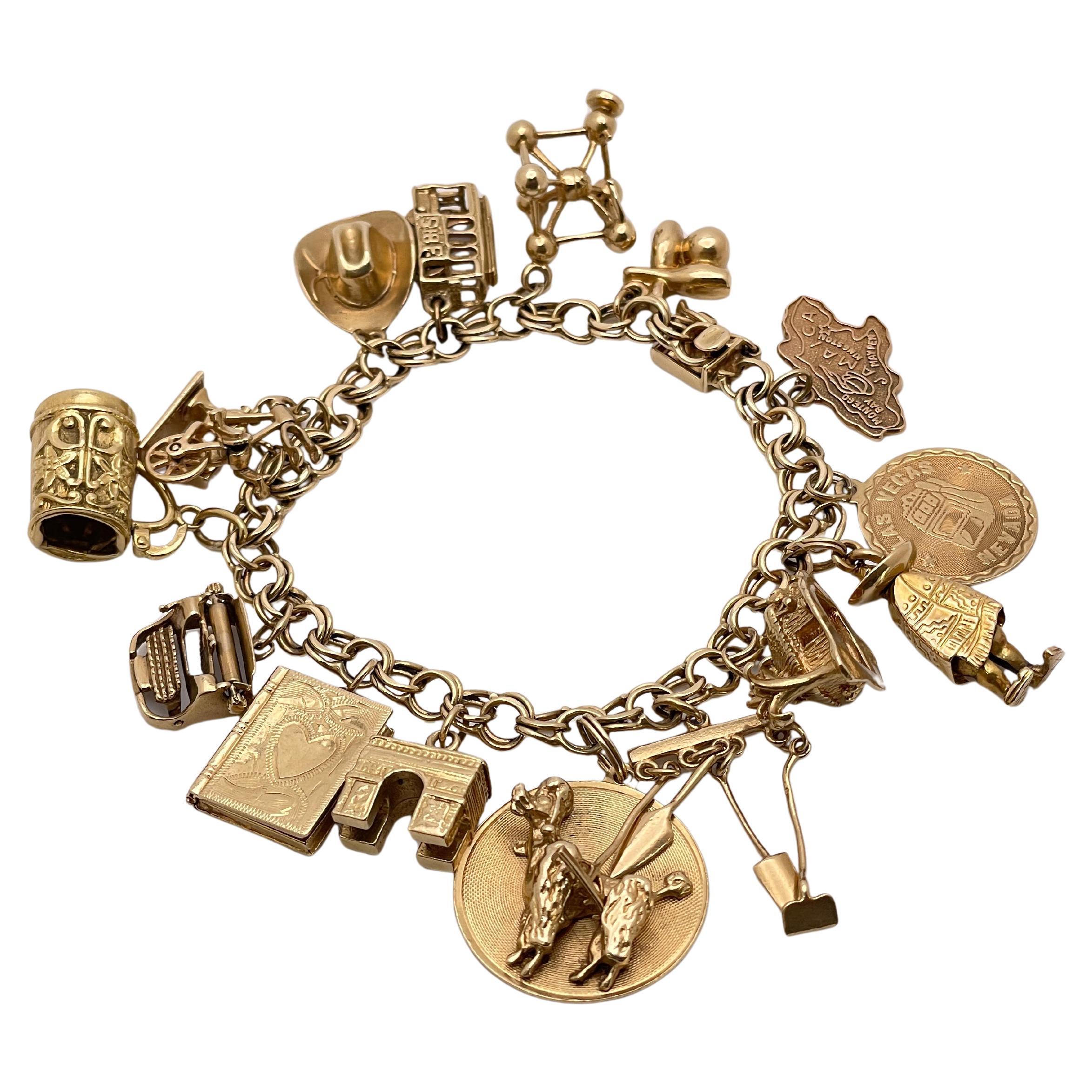 14K Yellow Gold Charm Bracelet with 14K & 10K Charms For Sale