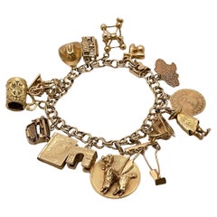 14K Yellow Gold Charm Bracelet with 14K & 10K Charms