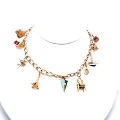 14K Yellow Gold Charm Necklace with 0.35 Carat Pear Shaped Jade 39.18 Grams