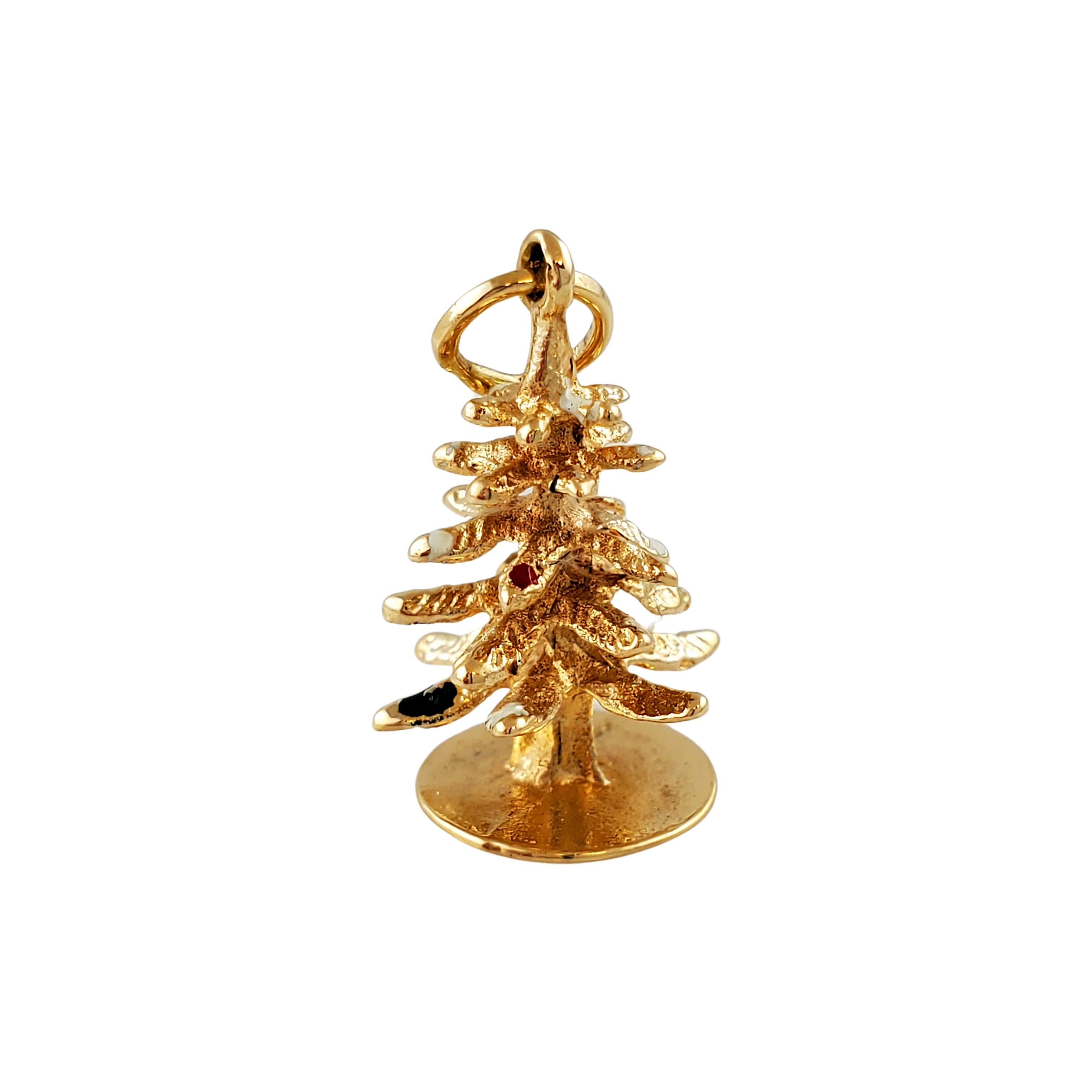 14K Yellow Gold Christmas Tree Charm Pendent

Beautiful 3D 14K yellow gold Christmas Tree charm has some colorful enamel depicting ornaments, enamel is in fair condition.

Size: 17.5mm X 11mm

Weight: 1.4 gr / 0.9 dwt

Hallmark: 14SK 

Very good
