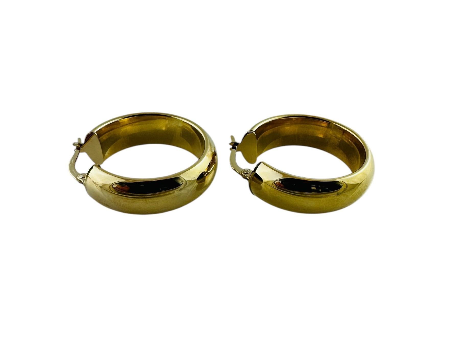 14K Yellow Gold Chunky Circular Hoop Earrings

These classic wide circular hoop earrings are set in polished 14K yellow gold.

Stamped 14K Italy

4.5 g / 2.9 dwt

Measurements: 28.09 mm in length, 26.9 mm wide, 7.8 mm wide

Very good preowned