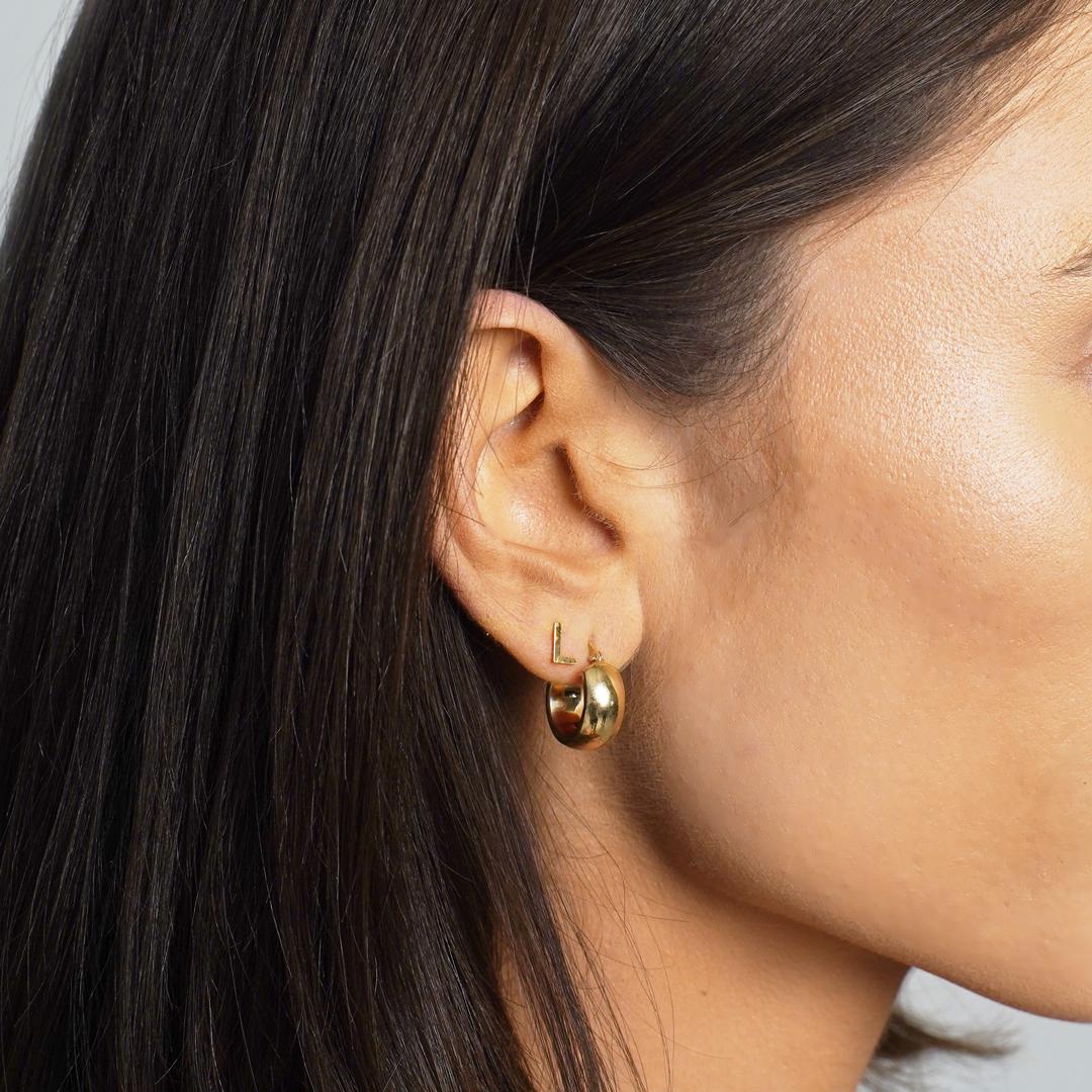 Looking for a bold and distinctive addition to your jewelry collection? Look no further than our Square Tube Hoop Earrings! With their modern geometric design and unique shape, these earrings are sure to make a statement wherever you go. Don't wait