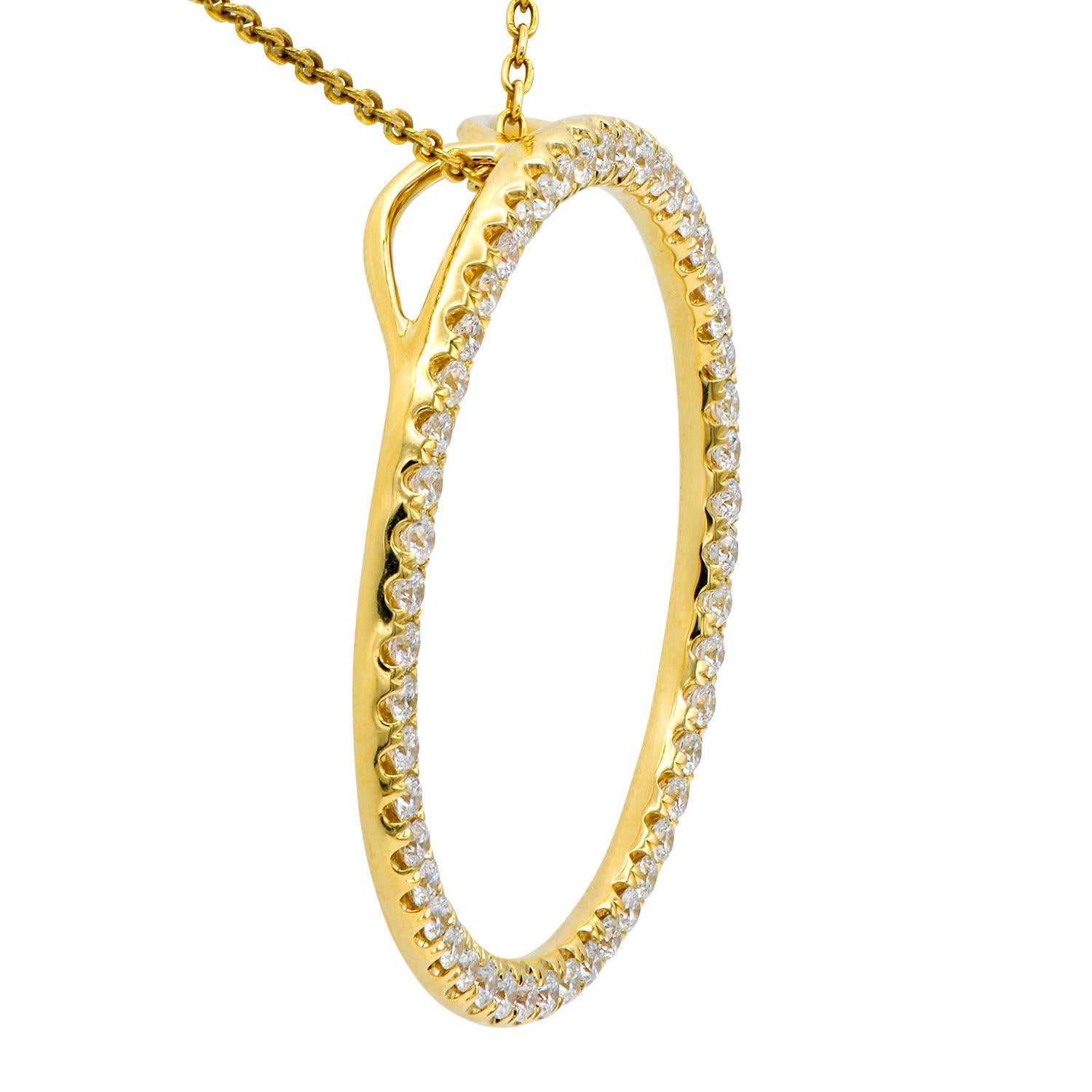 A perfect circle of beautiful sparkling diamonds is the perfect accessory for any occasion. This stunning pendant is made from 4.4 grams of 14 karat yellow gold, which is covered in 50 round VS2, G color diamonds, totaling 0.84 carats. Included is