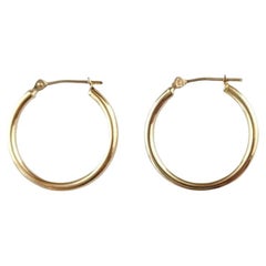 Orecchini a cerchio in oro giallo 14K #16774