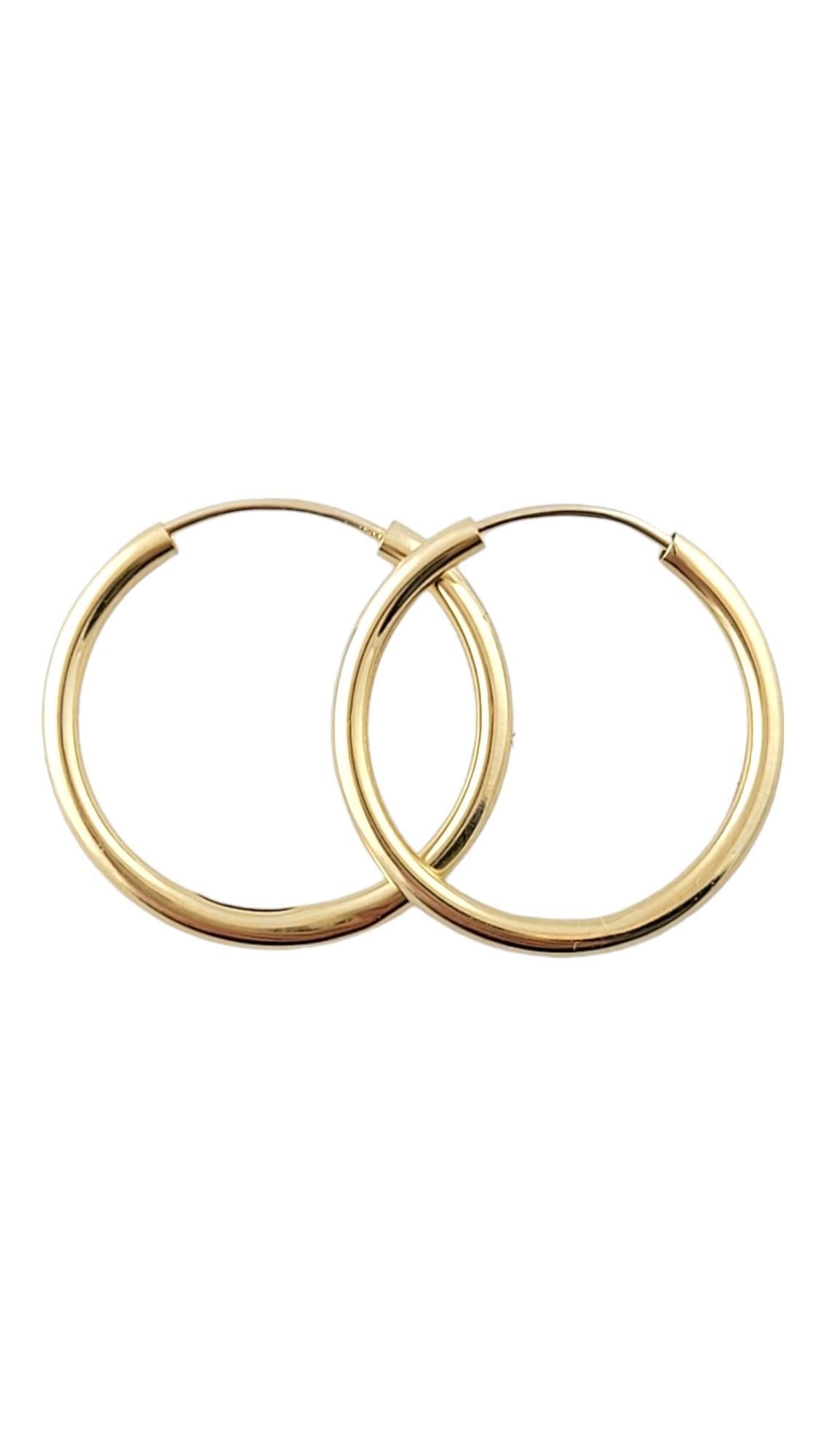 14K Yellow Gold Circle Hoop Earrings

These adorable, simple hoop earrings are crafted from 14K yellow gold for a gorgeous finish!

Diameter: 18.04mm
Width: 1.45mm

Weight: 0.30 dwt/ 0.46 g

Hallmark: ZZR 585

Very good condition, professionally