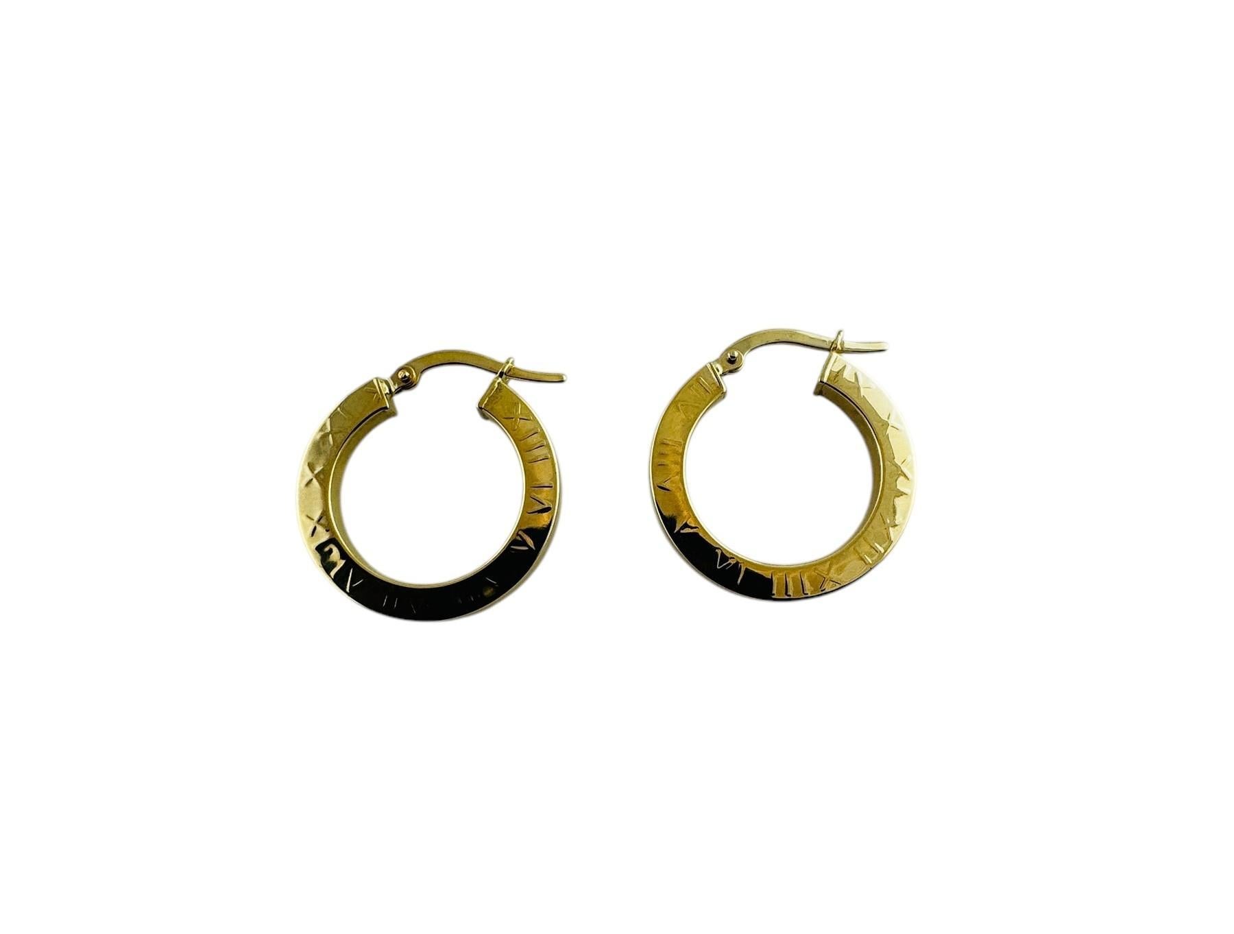 14K Yellow Gold Circular Hoop Earrings with Roman Numeral Design

These fun circle hoop earrings feature a roman numeral design and are set in 14K yellow gold

Stamped 14KT Italy OR

Measurements: 23.3 mm in length, 21.6 mm wide, 2.84 mm thick

1.97