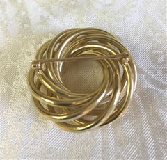 14 Karat Yellow Gold Circular Knot Brooch