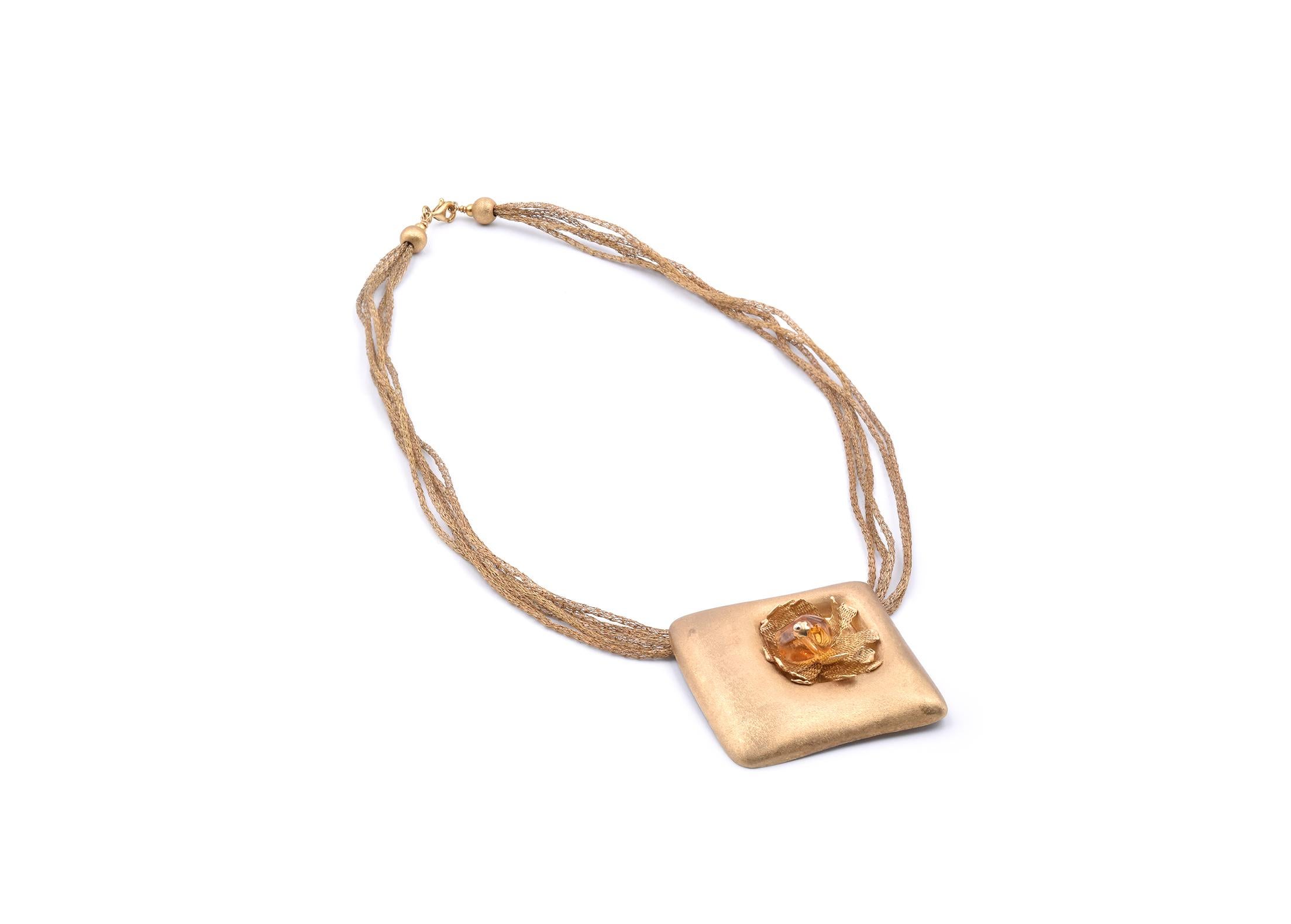 Material: 14k yellow gold
Gemstone: Citrine
Dimensions: necklace is 17-inches in length, pendant measures 16.88mm x 15.47mm
Weight: 14.7 grams
