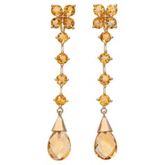 Orecchini a perno e a goccia in oro giallo 14k con motivi floreali