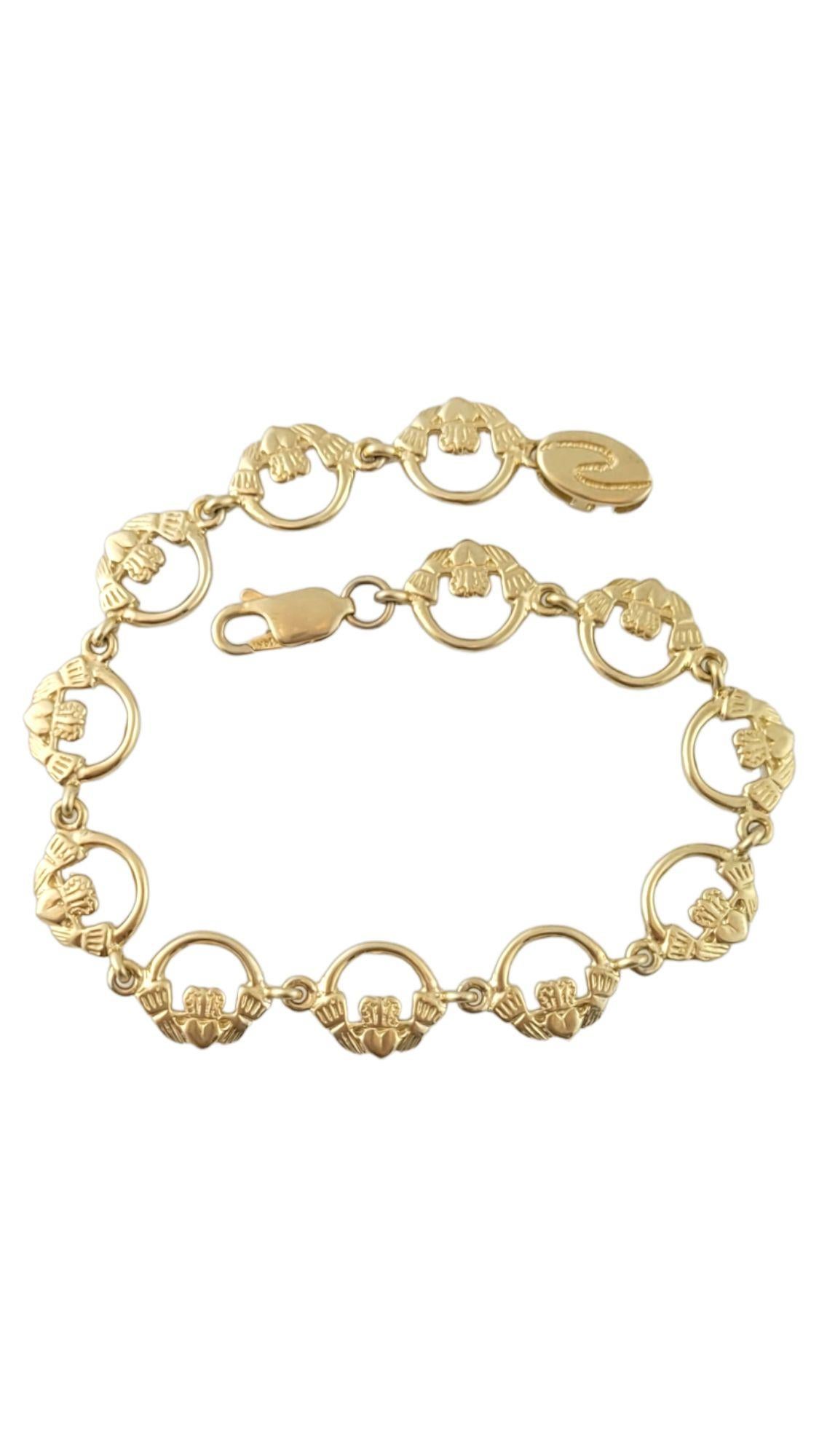 Gorgeous Claddagh bracelet made of 14K yellow gold!

Size: 7