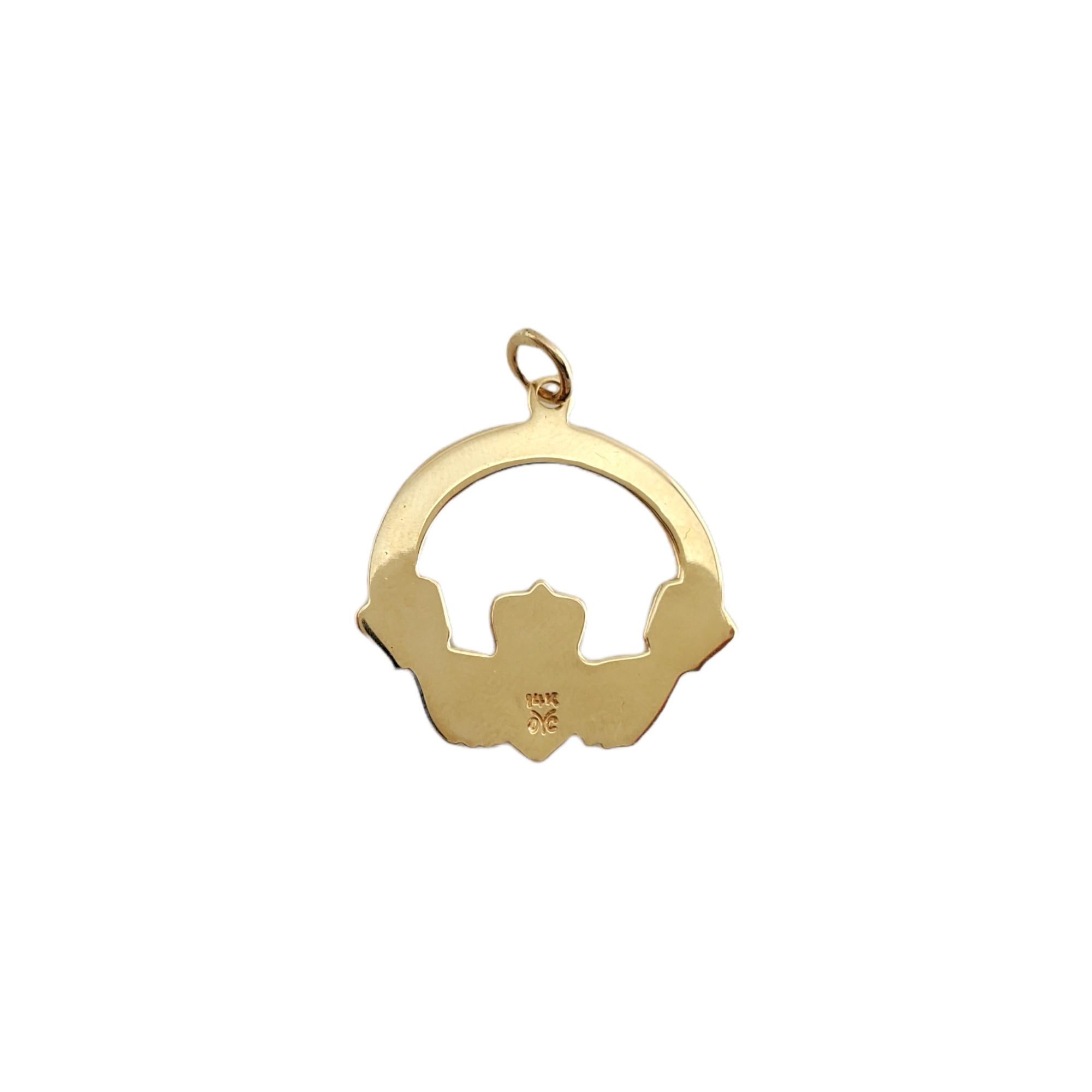 14K Yellow Gold Claddagh 
 
You'll love this beautiful yellow gold Claddagh! 

Size: 22.25mm X 22.90mm

Weight: 2.3 gr /  1.4dwt

Hallmark: 14K  oYc 

Very good condition, professionally polished.

Will come packaged in a gift box and will be