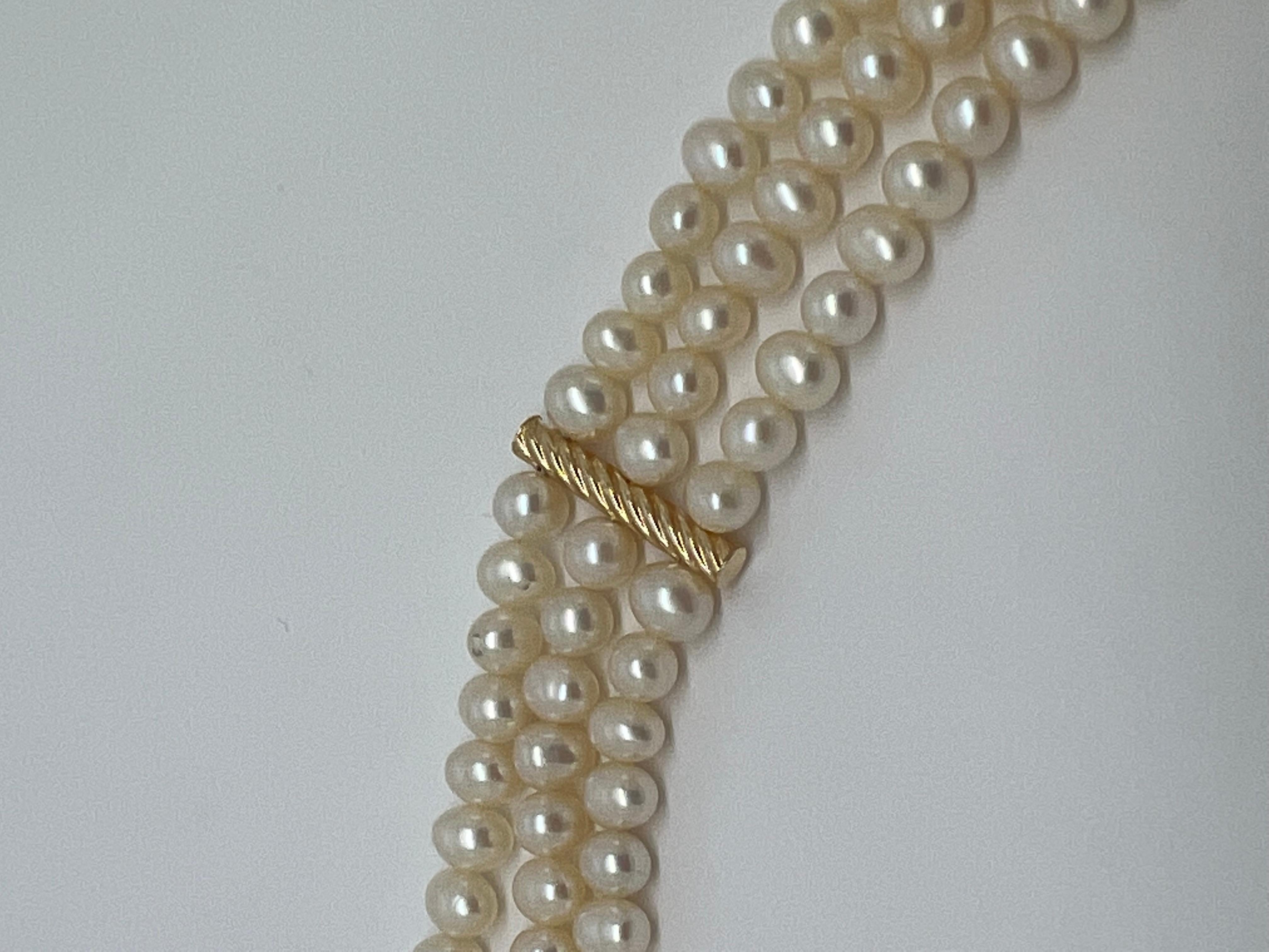 Art Deco 14K Yellow Gold Clasp Pearl Triple Strand Bracelet For Sale