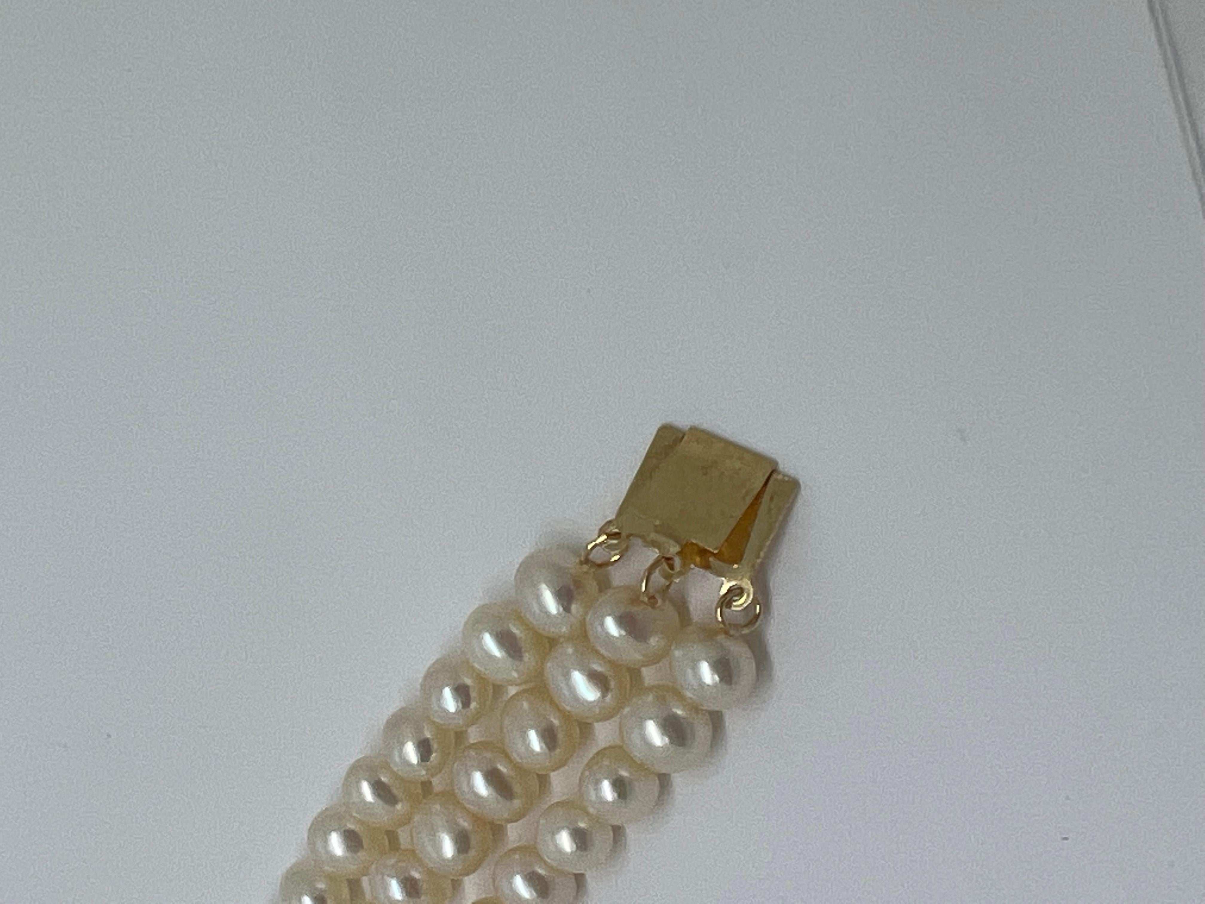 Round Cut 14K Yellow Gold Clasp Pearl Triple Strand Bracelet For Sale