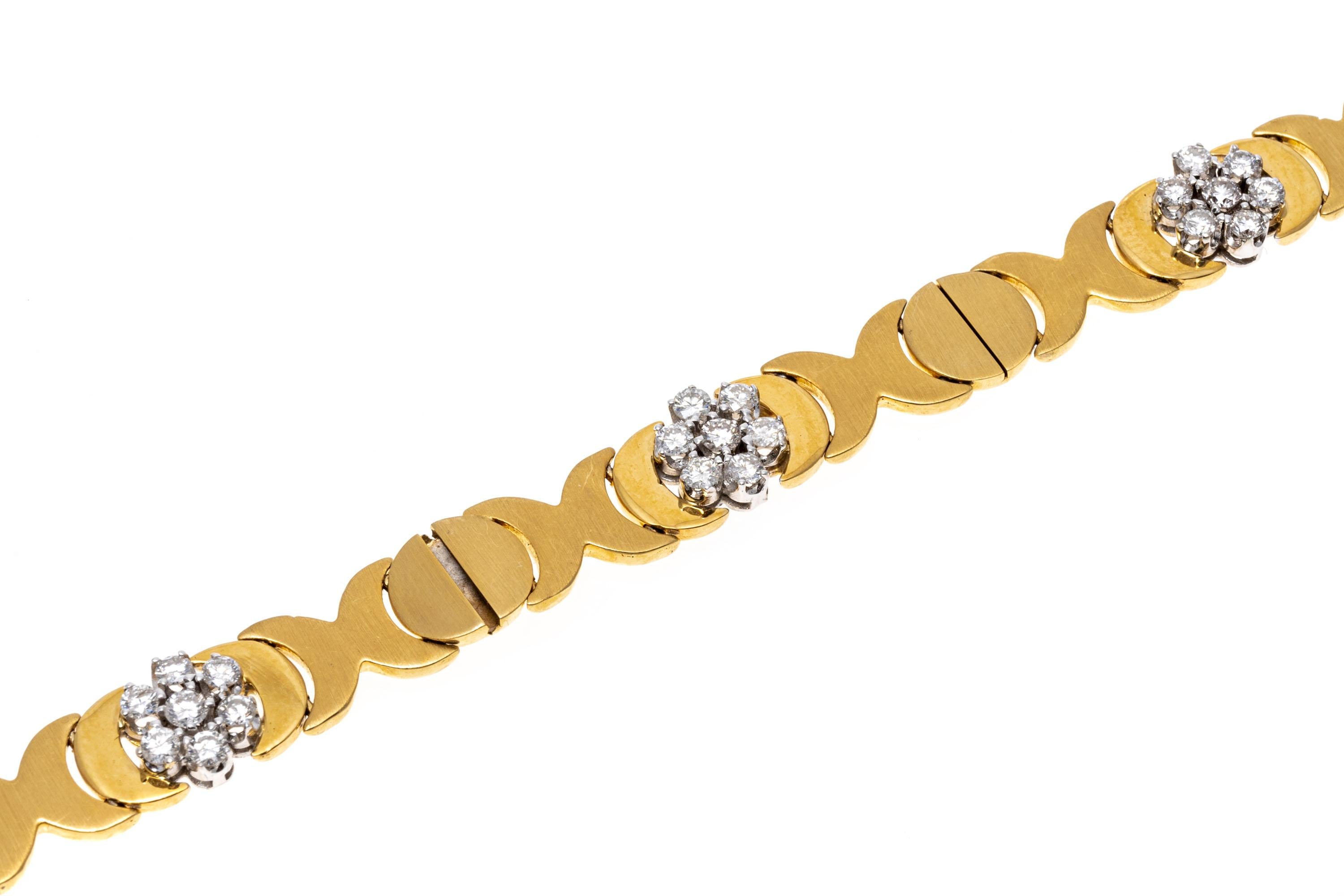 14k yellow gold bracelet. This classic bracelet is a brushed and polished 