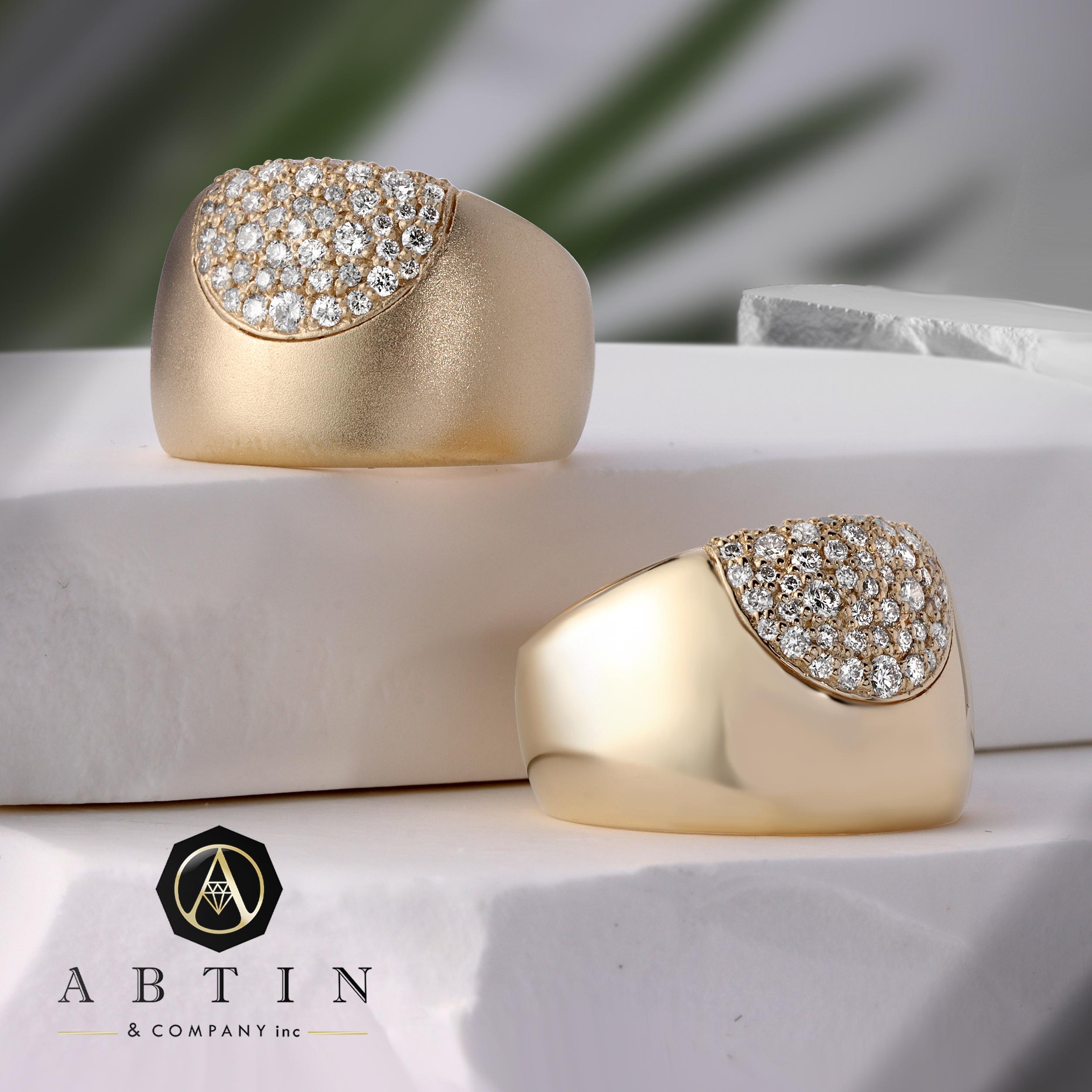 Crafted in 14K gold, this exquisite ring features a dome design and a dazzling arrangement of 0.53 carats of glistening diamonds. Its high-domed design sparkles with round brilliant-cut diamonds set on matt polished gold. This statement ring is a