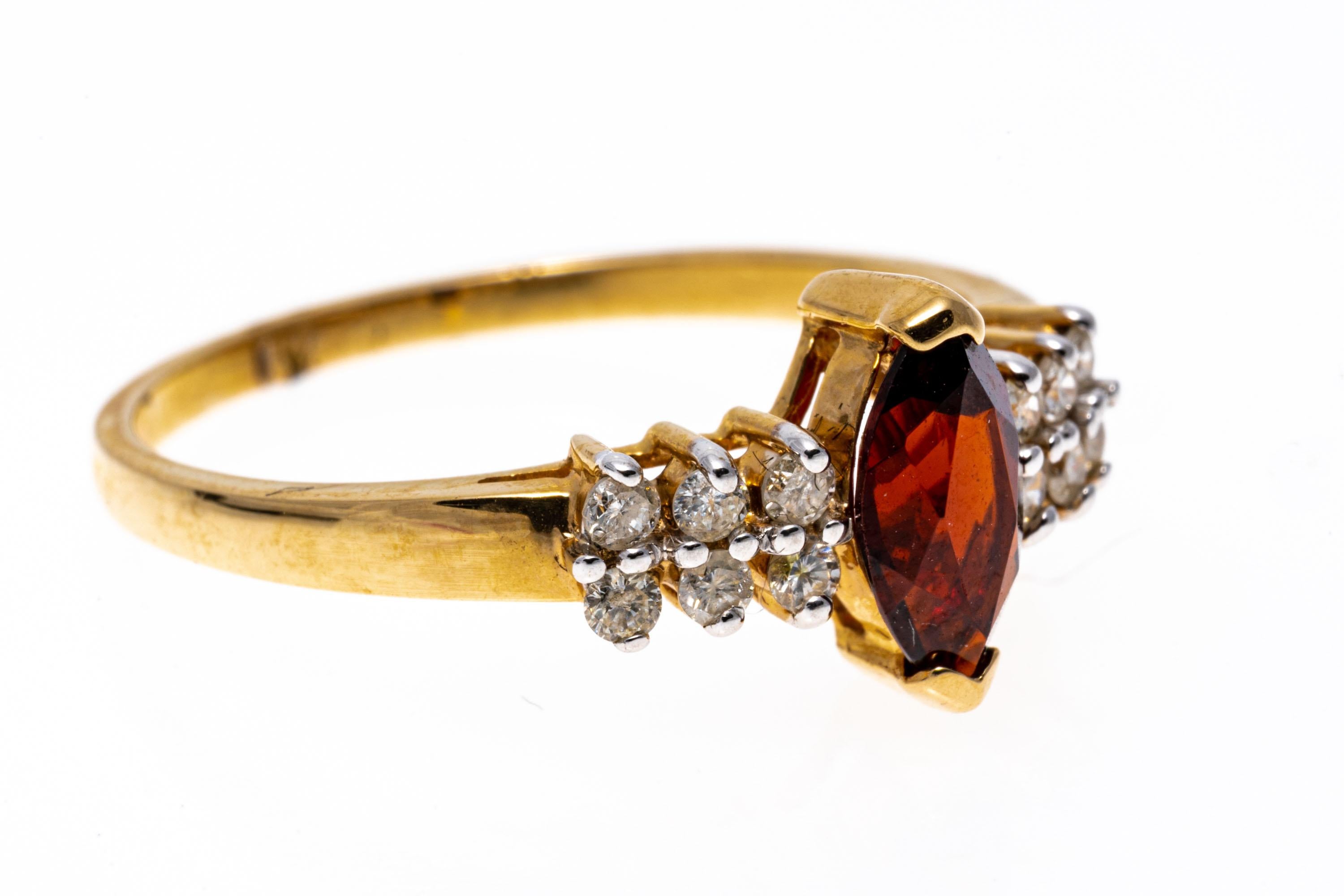 Marquise Cut 14k Yellow Gold Classic Marquise Garnet and Diamond Ring For Sale