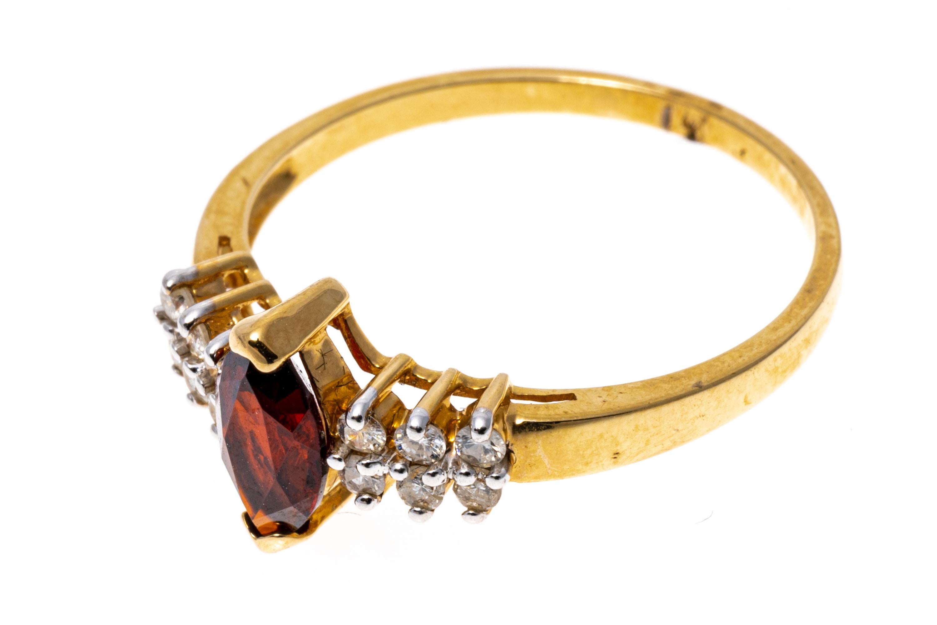 Women's 14k Yellow Gold Classic Marquise Garnet and Diamond Ring For Sale