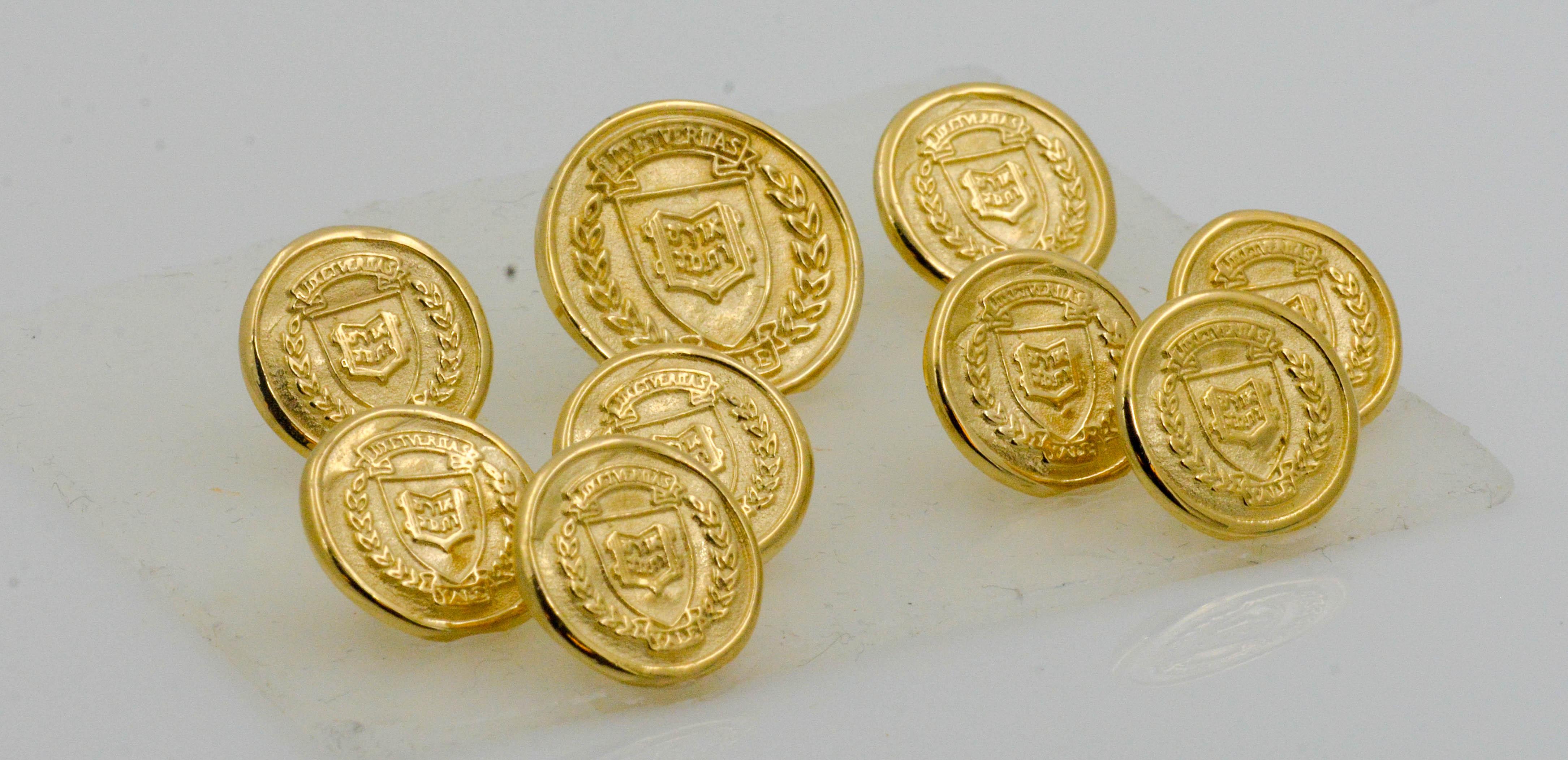 Traditional and Vintage Yale University Coat of Arms buttons were manufactured by The Waterbury Button Company; the oldest button company in the United States. Buttons are set in 14K yellow gold and the backs are completed with a fully soldered