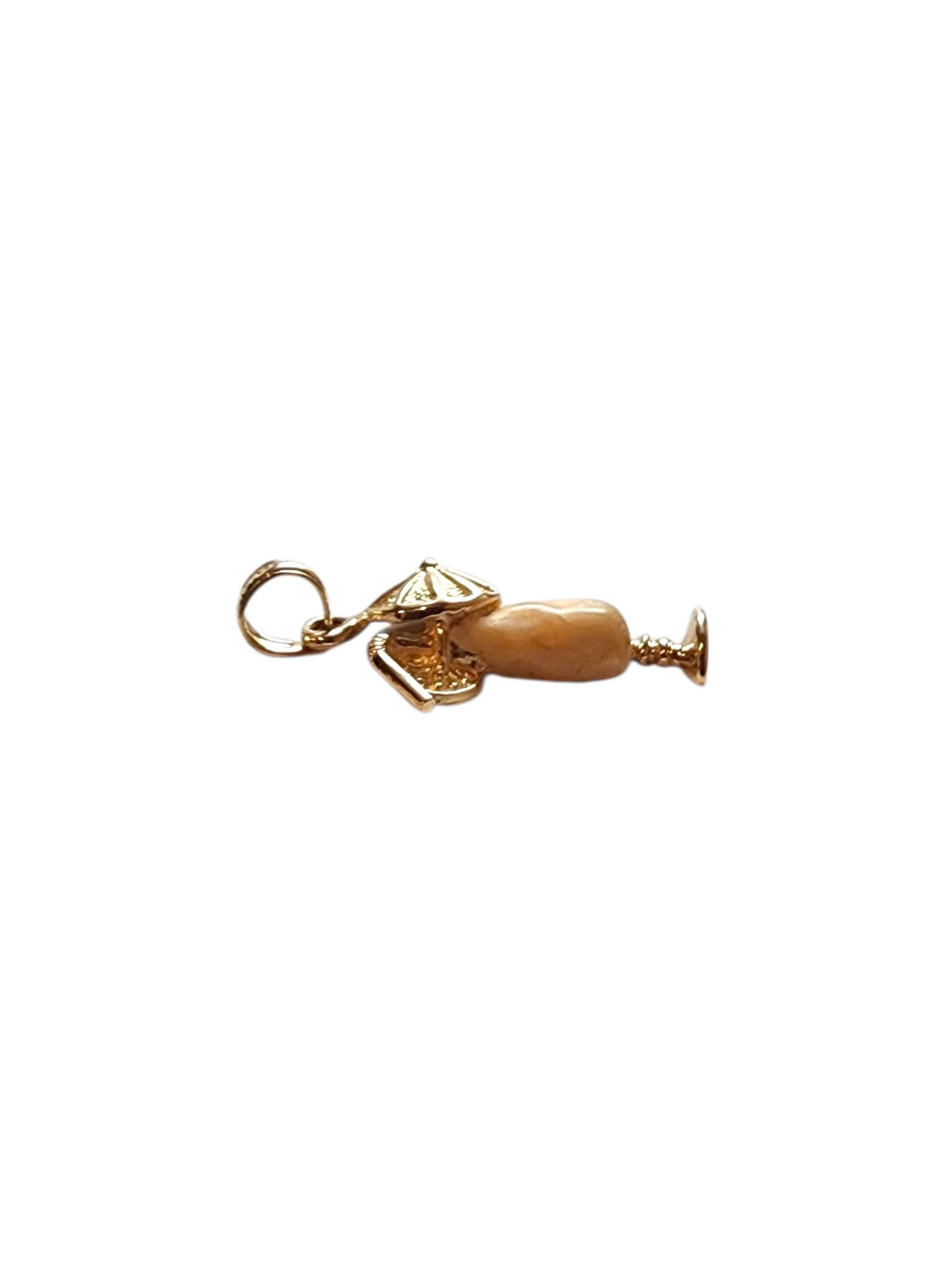 14K Yellow Gold Cocktail Drink Charm -

Crafted in 14K yellow gold, this playful cocktail drink charm adds a fun, festive flair to any jewelry piece. Featuring a detailed design with a tiny straw and garnish, it's the perfect accessory for