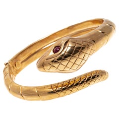 14k Yellow Gold Coiled Snake Motif Hinged Bangle with Cabachon Ruby Eyes