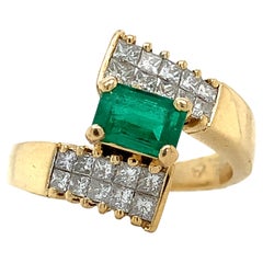 14k Yellow Gold Colombian Emerald 
Invisible Set Princess Cut Diamonds Ring