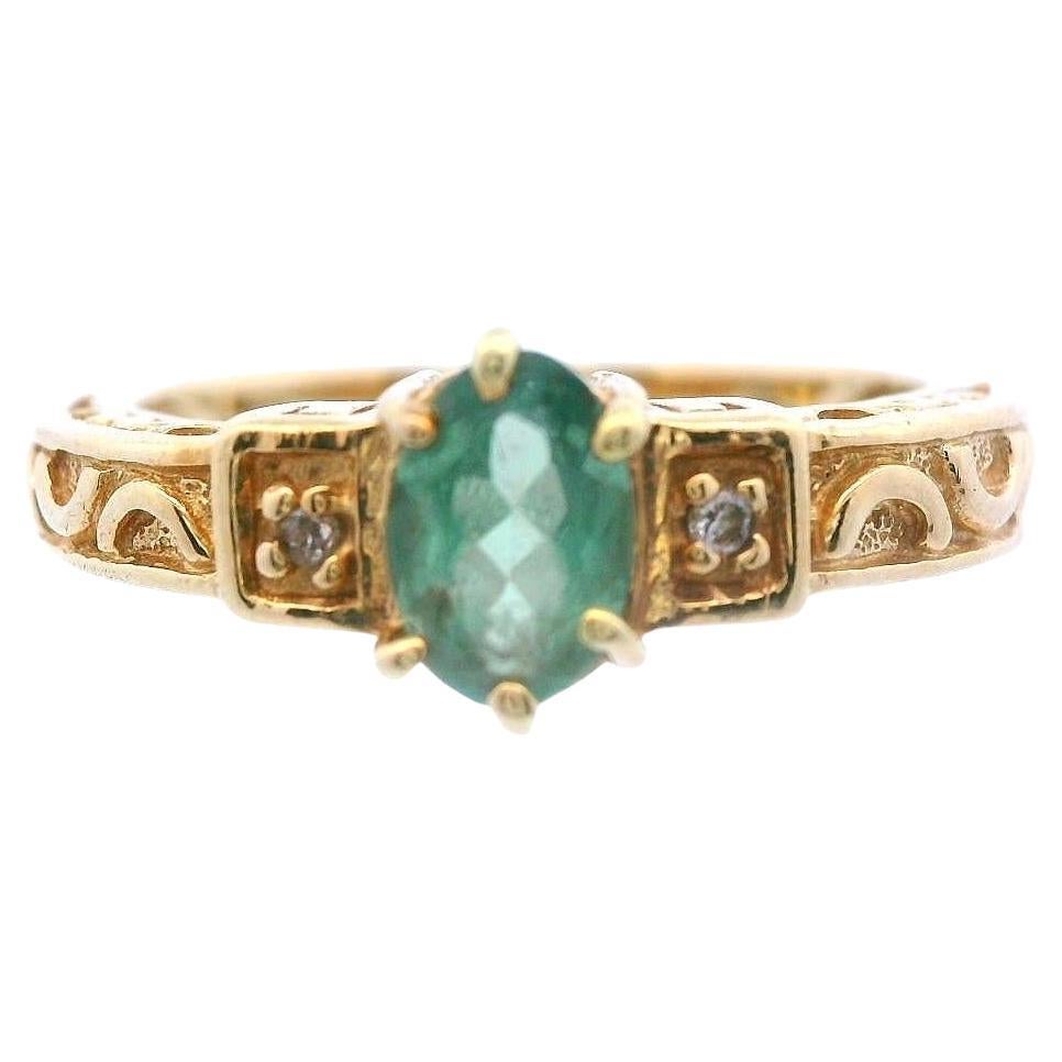 Anello con alessandrite e diamante in oro giallo 14K con variazione di colore