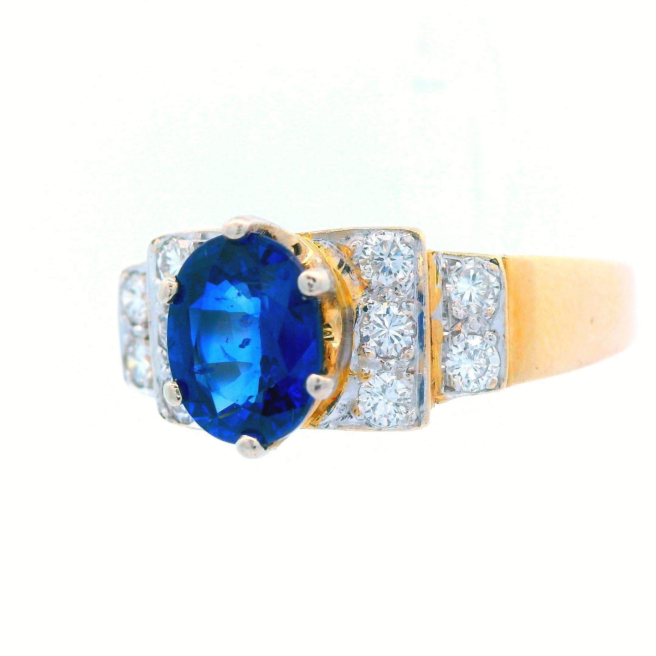 This is a stunning, contemporary, blue sapphire and diamond ring made in 14k yellow gold. Sapphire is said to bring luck, loyalty, happiness and love to its wearer, making this ring the perfect gift for that special someone or a loved one. The