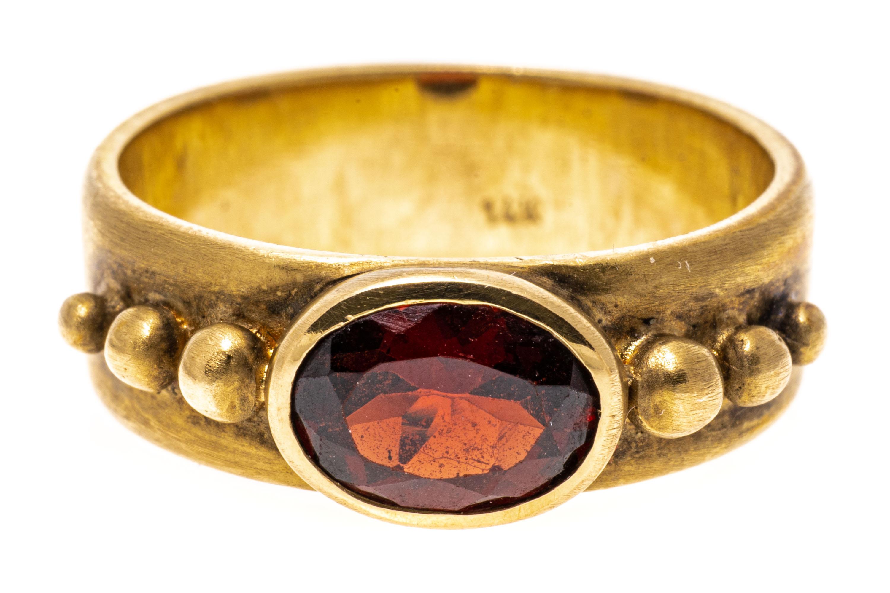 14k Yellow Gold Contemporary Burnished Bezel Set Garnet Band Ring For Sale 3