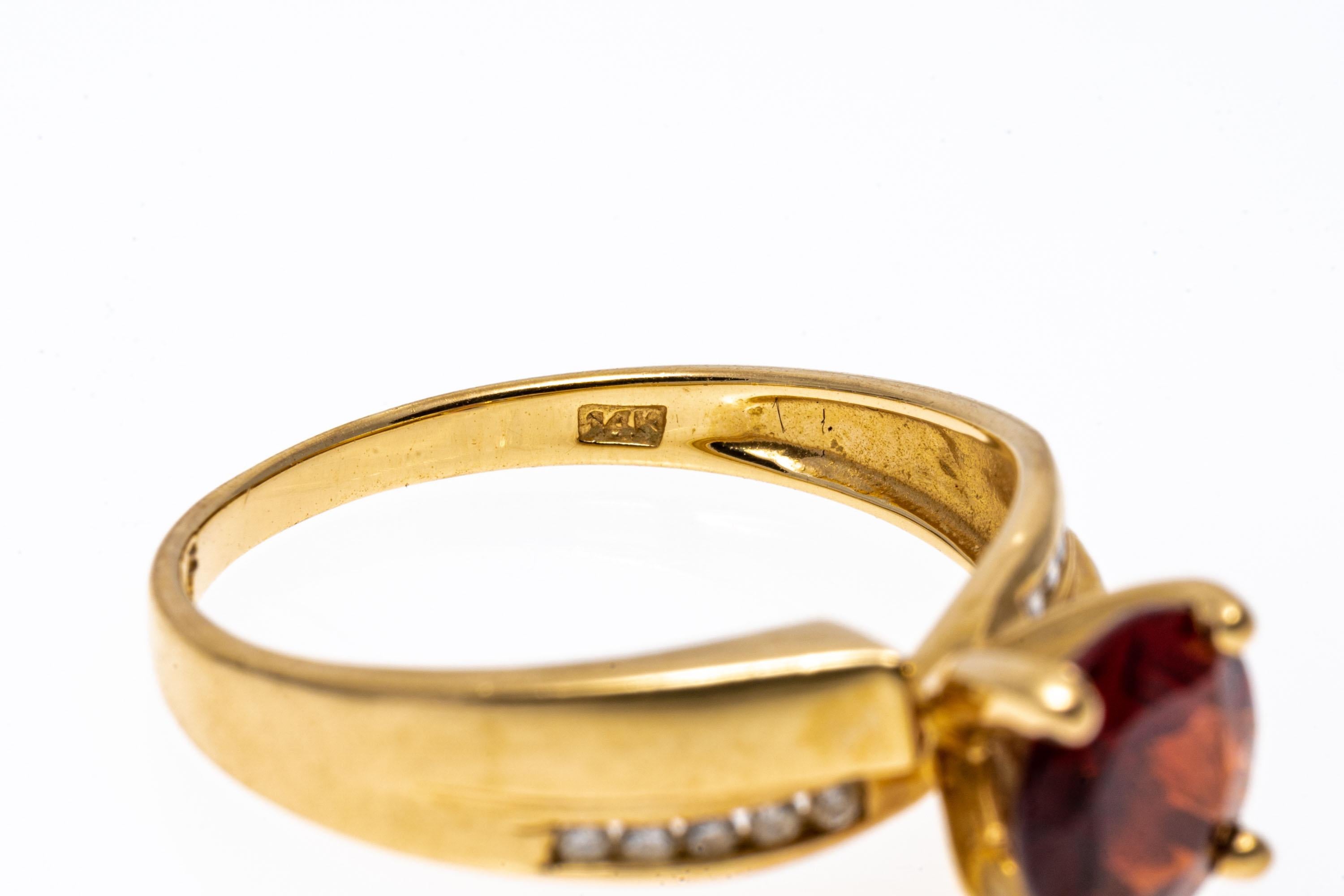 14k Yellow Gold Contemporary Garnet and Channel Diamond Ring In Good Condition For Sale In Southport, CT