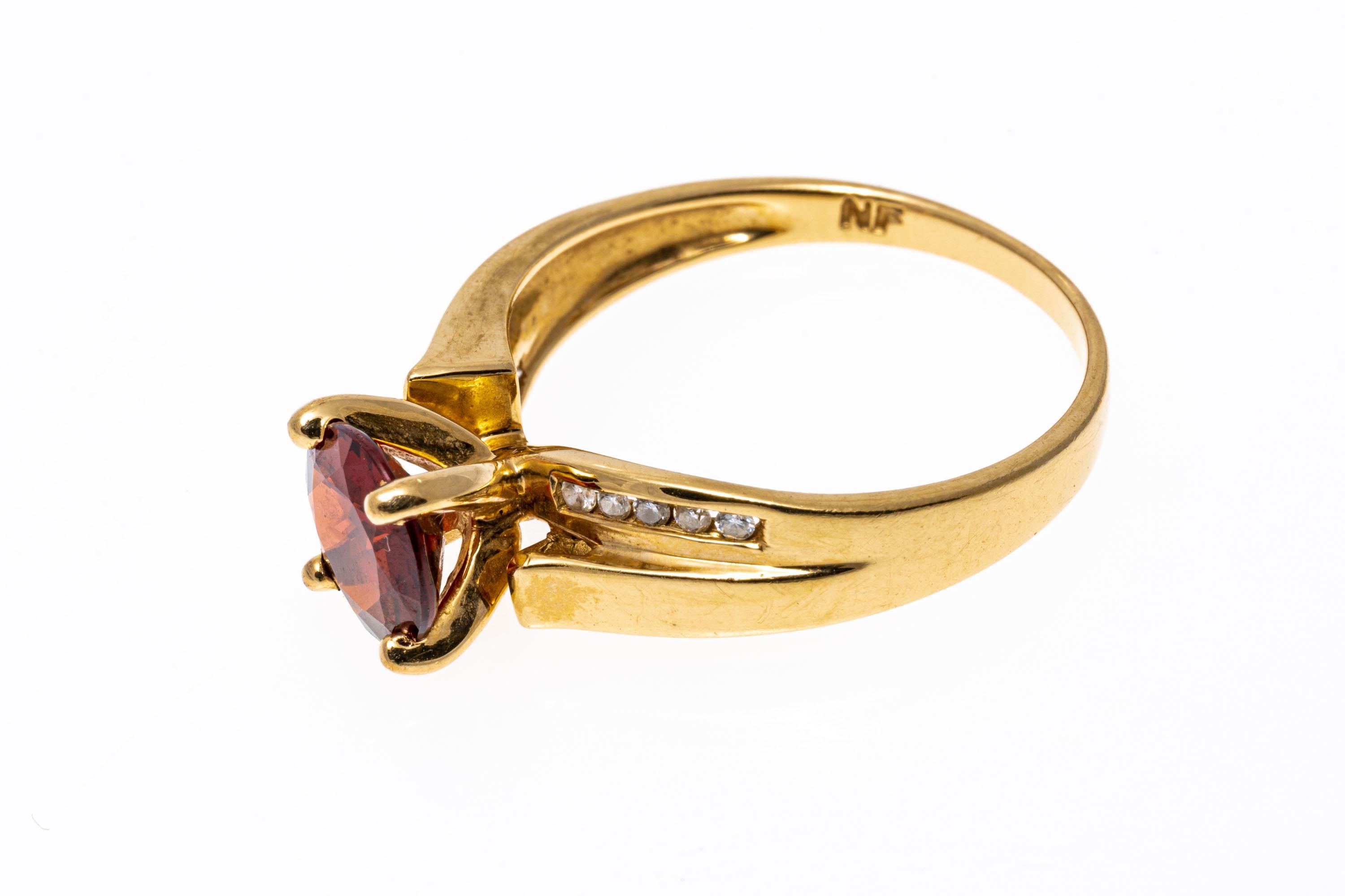 14k Yellow Gold Contemporary Garnet and Channel Diamond Ring For Sale 1