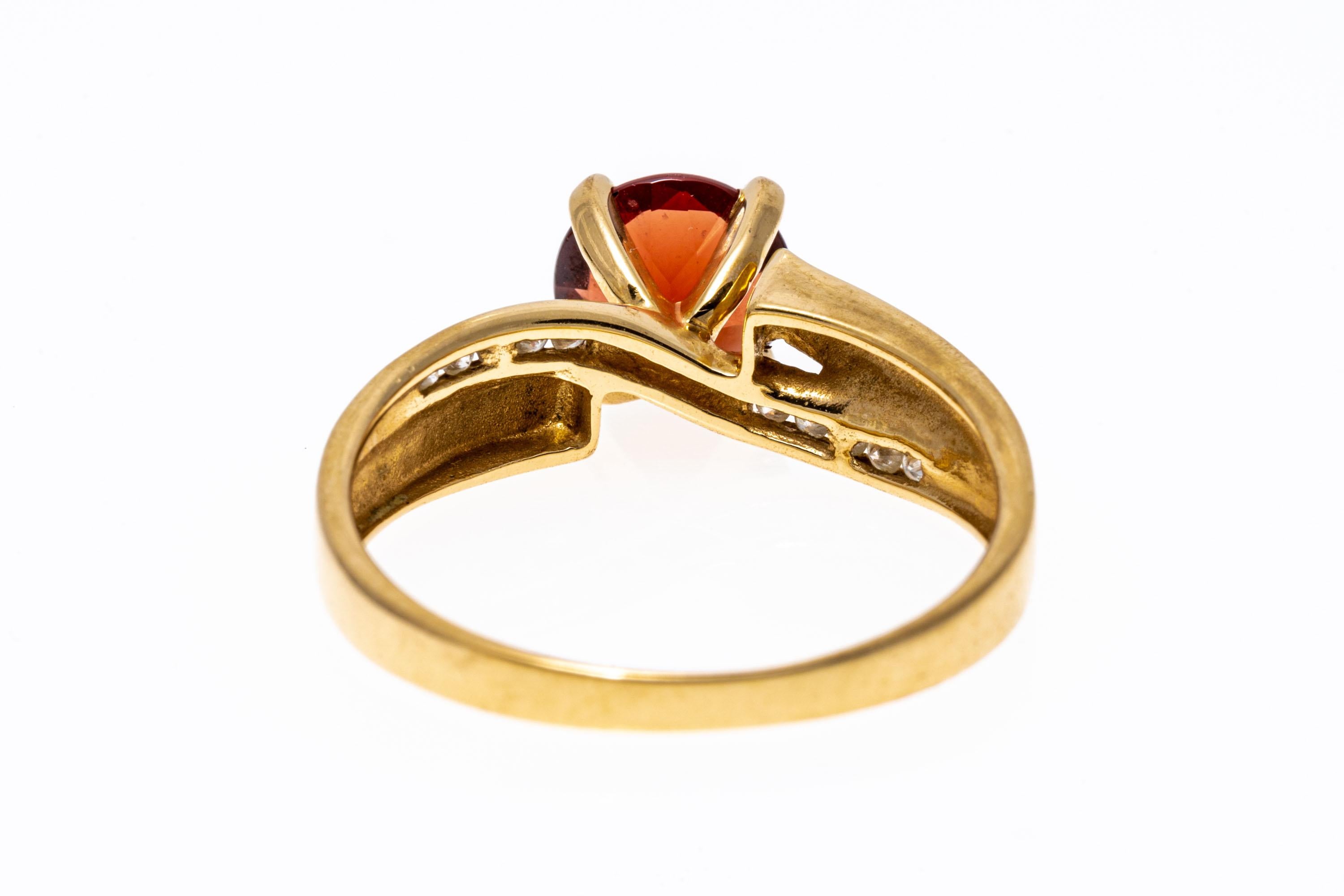 14k Yellow Gold Contemporary Garnet and Channel Diamond Ring For Sale 2