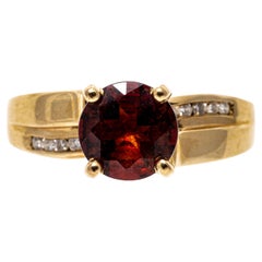 Vintage 14k Yellow Gold Contemporary Garnet and Channel Diamond Ring